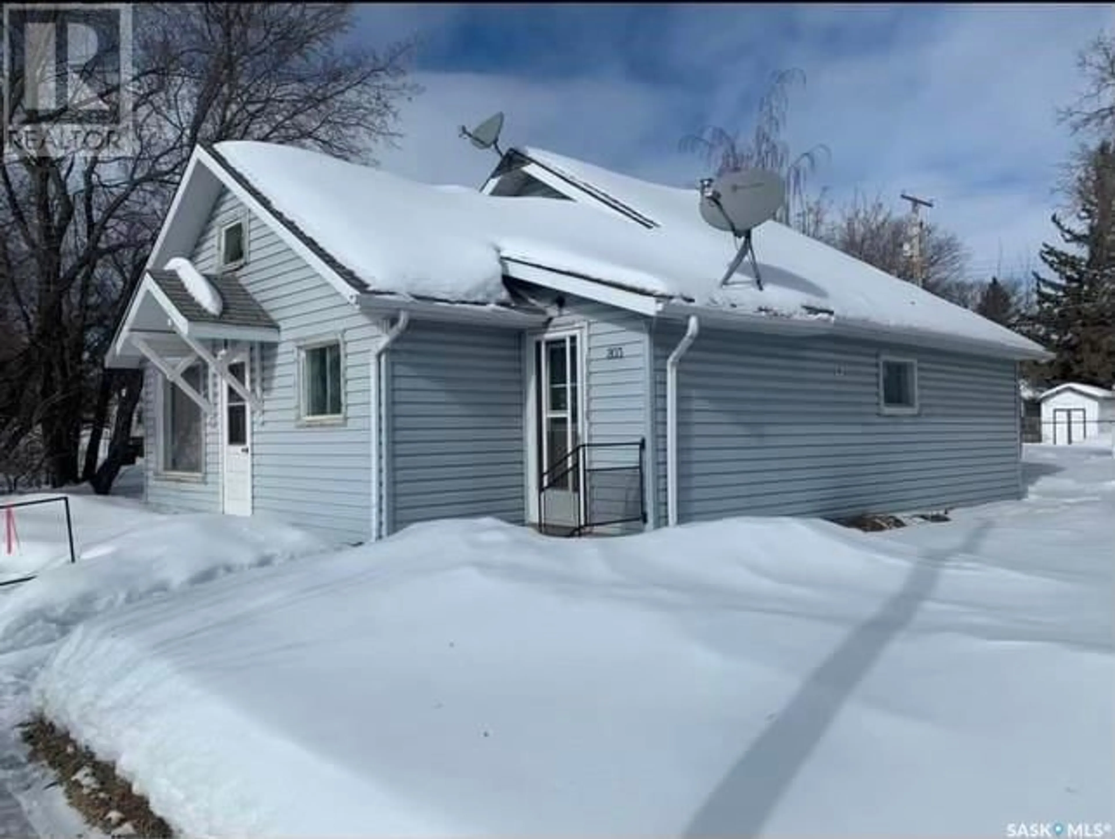 Frontside or backside of a home, the front or back of building for 203 Centre STREET, Naicam Saskatchewan S0K2Z0