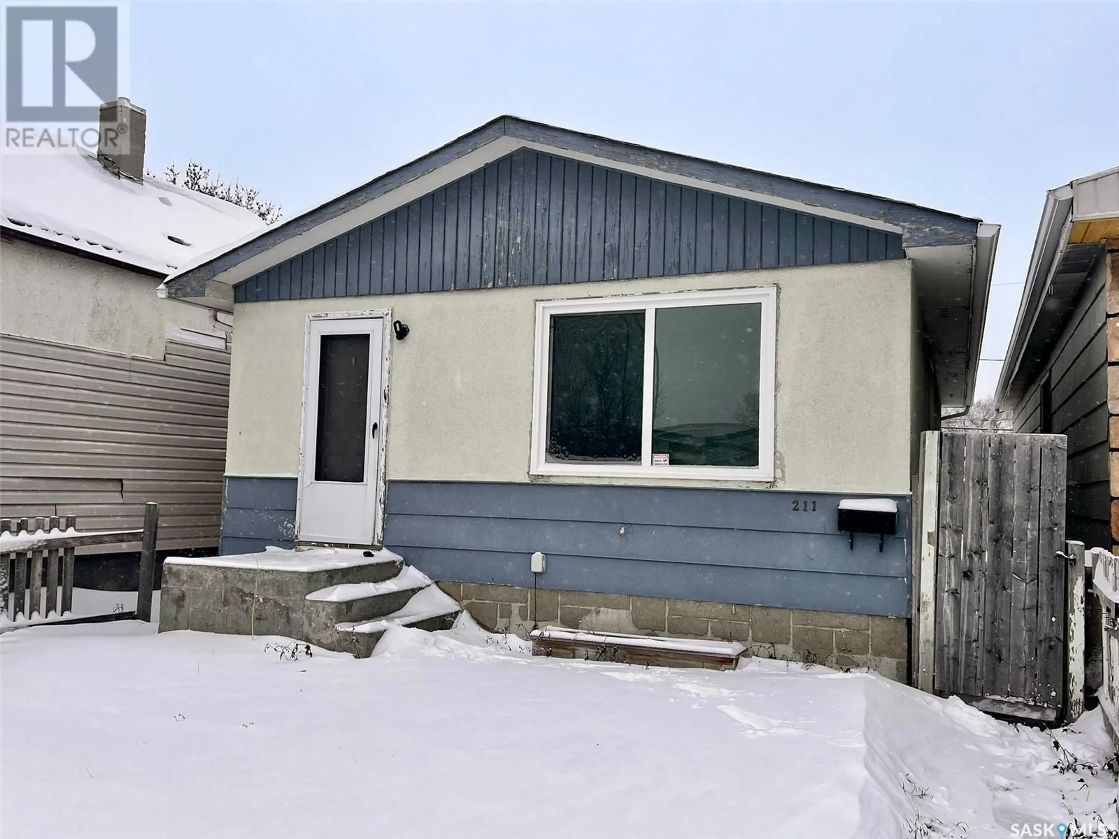 Frontside or backside of a home, the front or back of building for 211 Broad STREET, Regina Saskatchewan S4R1X1