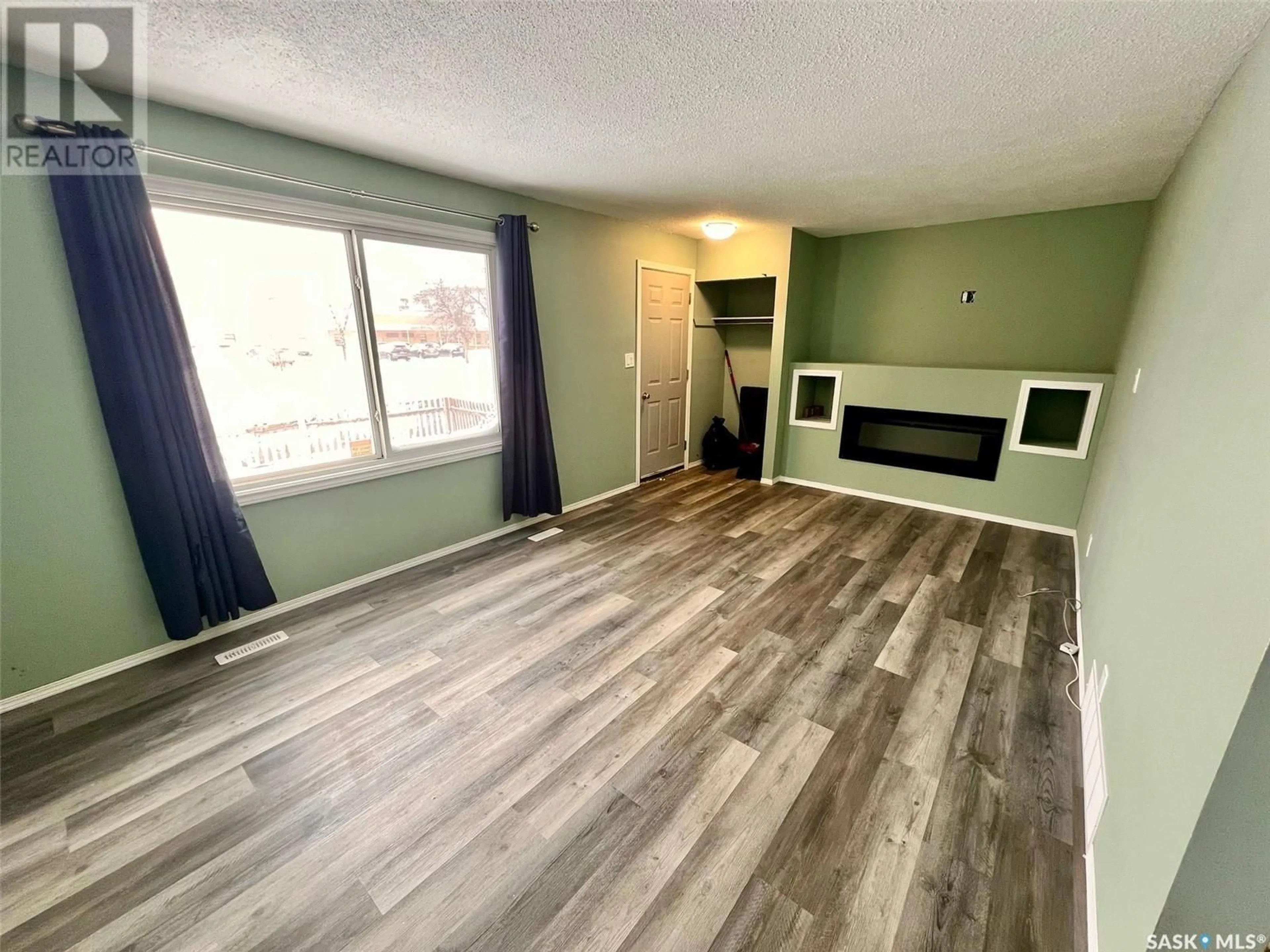 A pic of a room, wood floors for 211 Broad STREET, Regina Saskatchewan S4R1X1