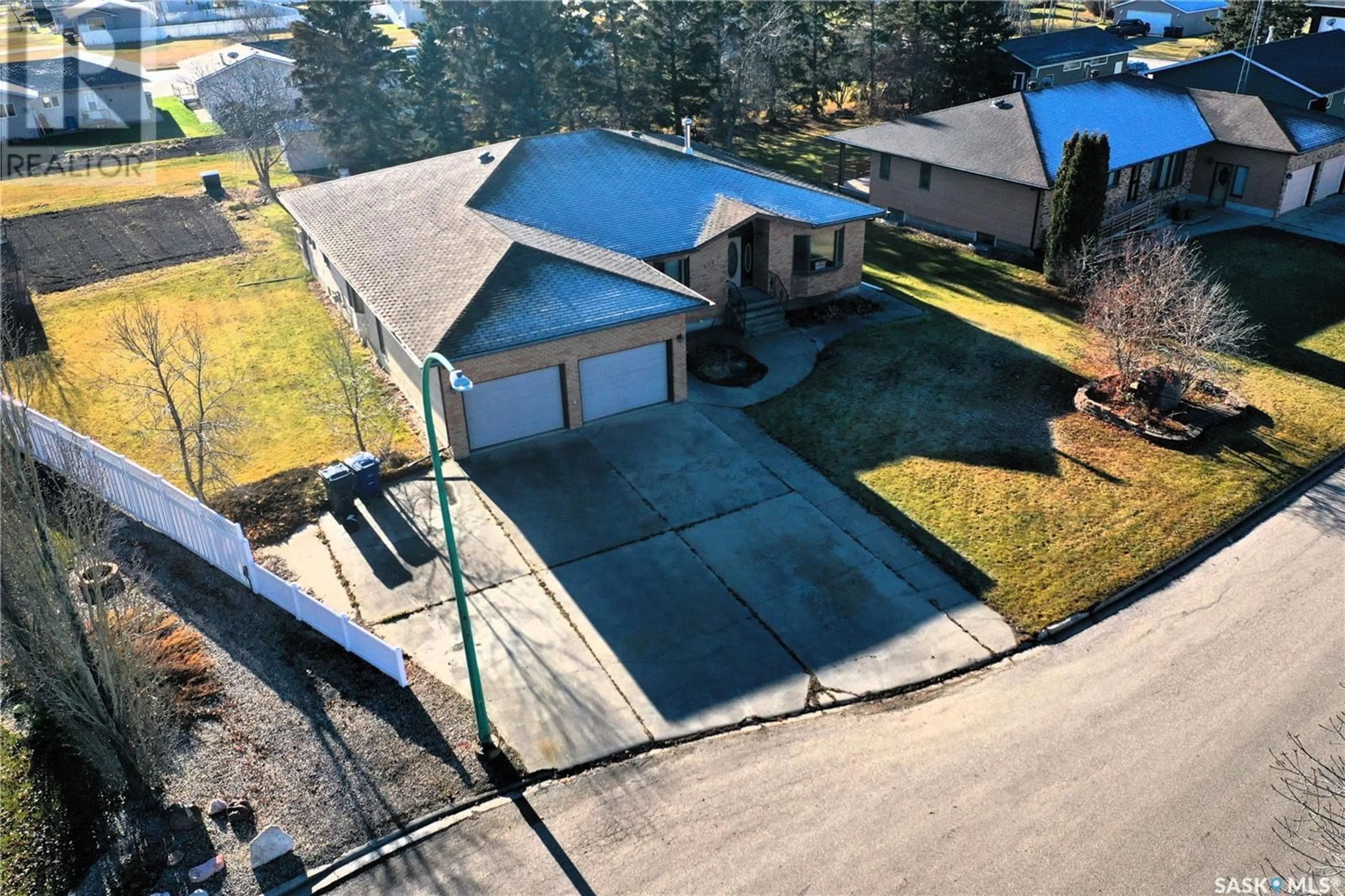 Frontside or backside of a home, the fenced backyard for 525 Fir CRESCENT, Carrot River Saskatchewan S0E0L0