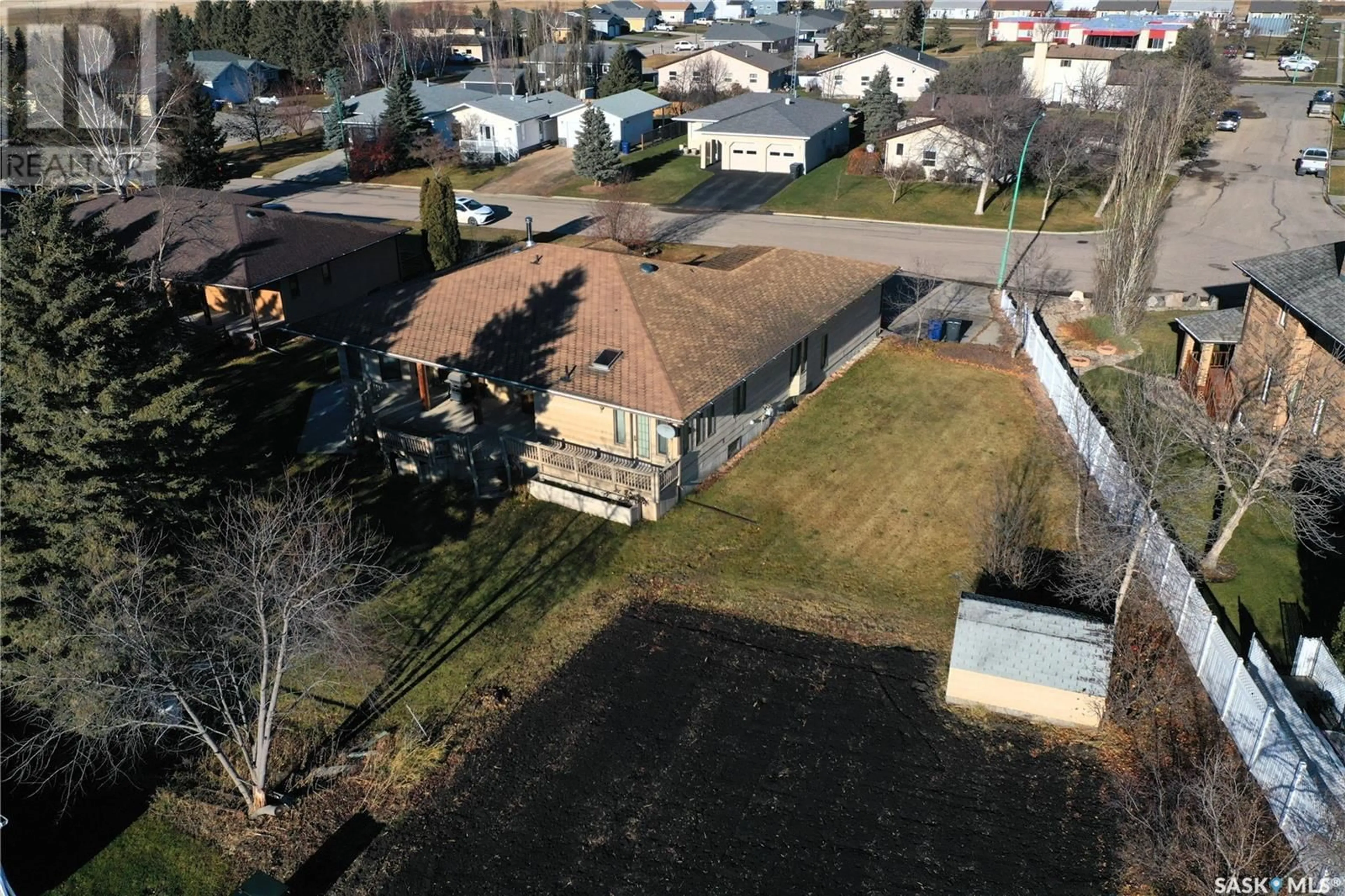 Frontside or backside of a home, the fenced backyard for 525 Fir CRESCENT, Carrot River Saskatchewan S0E0L0