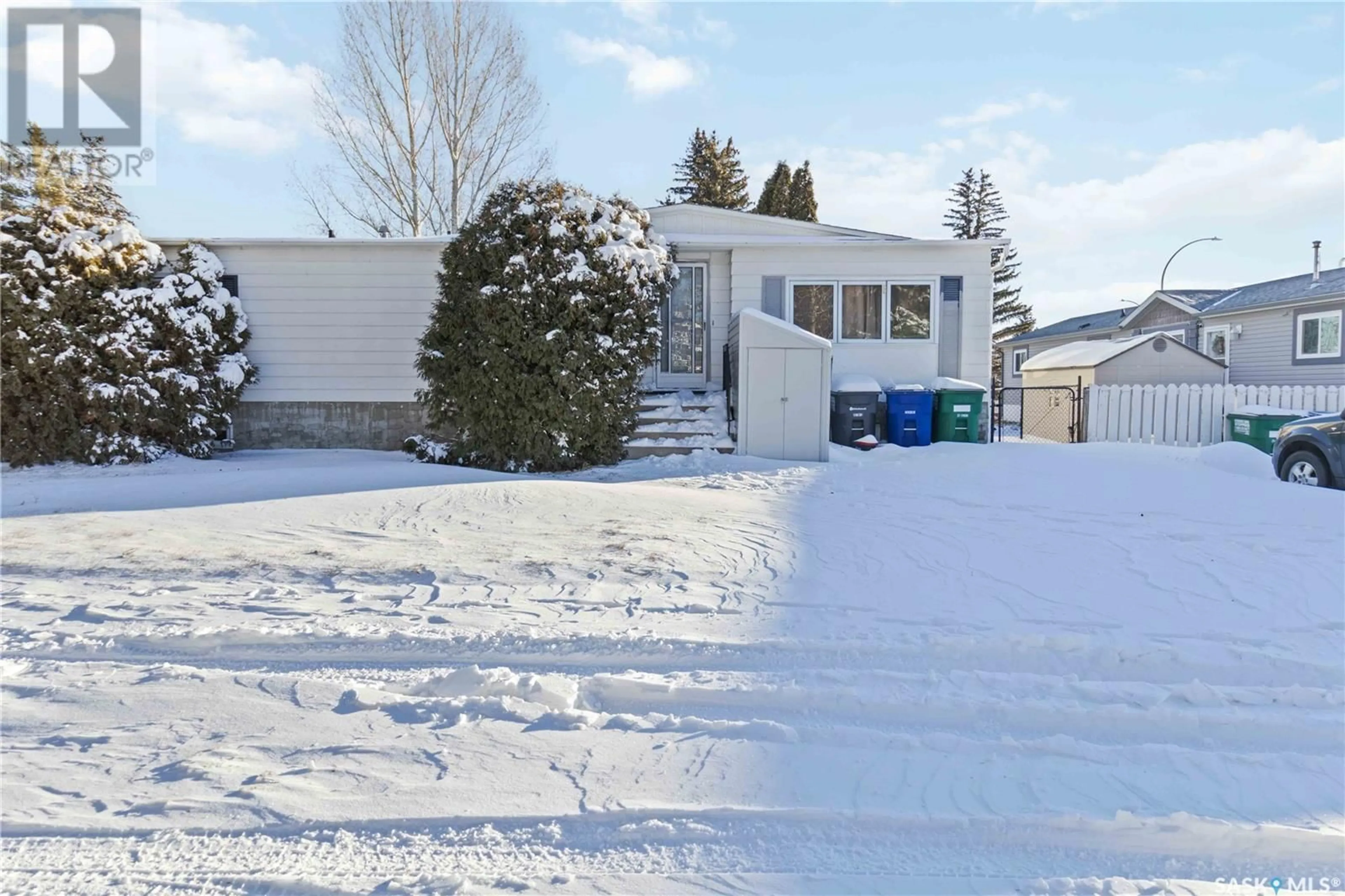 Frontside or backside of a home, the fenced backyard for 239 Leland COURT, Saskatoon Saskatchewan S7H5A2