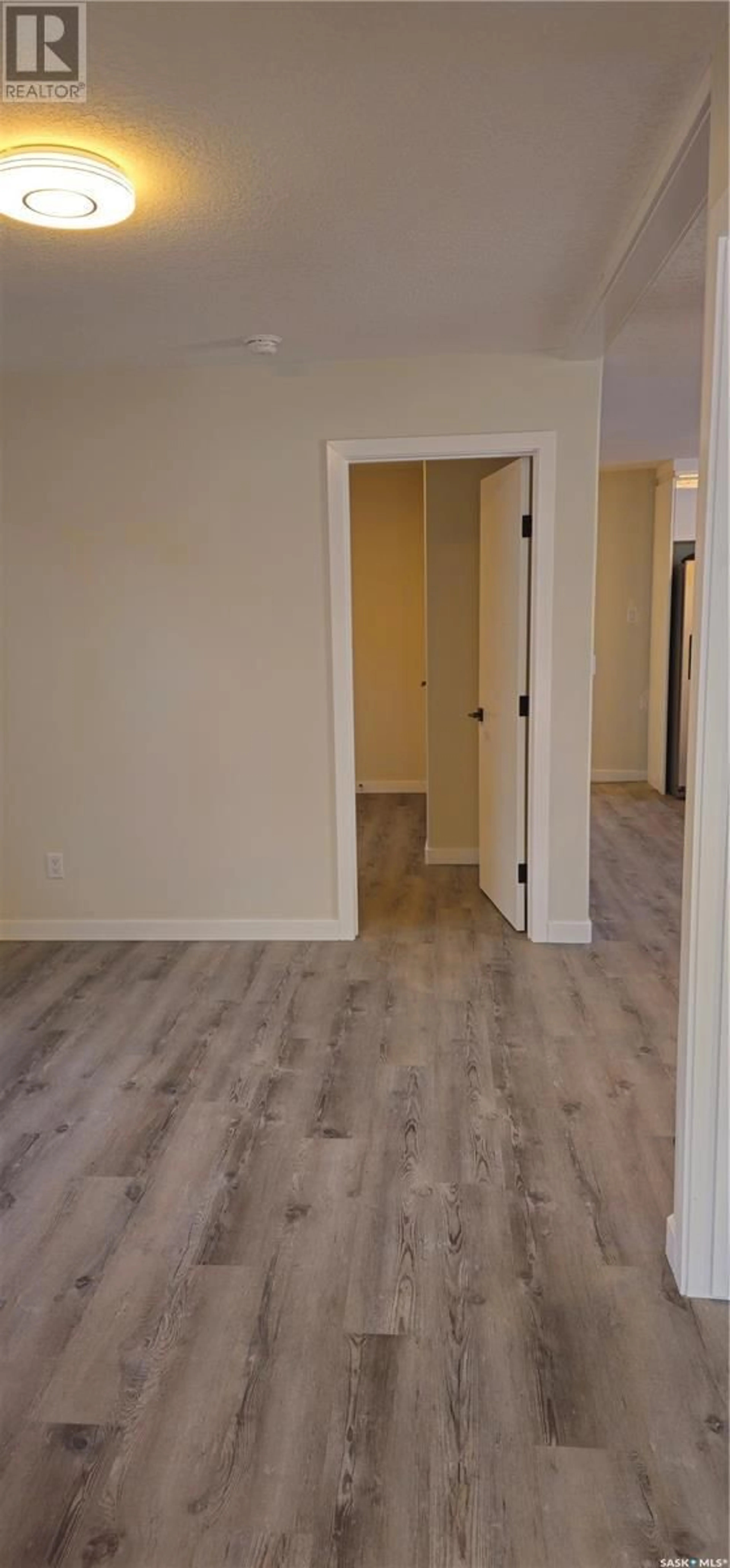 A pic of a room, wood floors for 1149 K AVENUE N, Saskatoon Saskatchewan S7L2N7