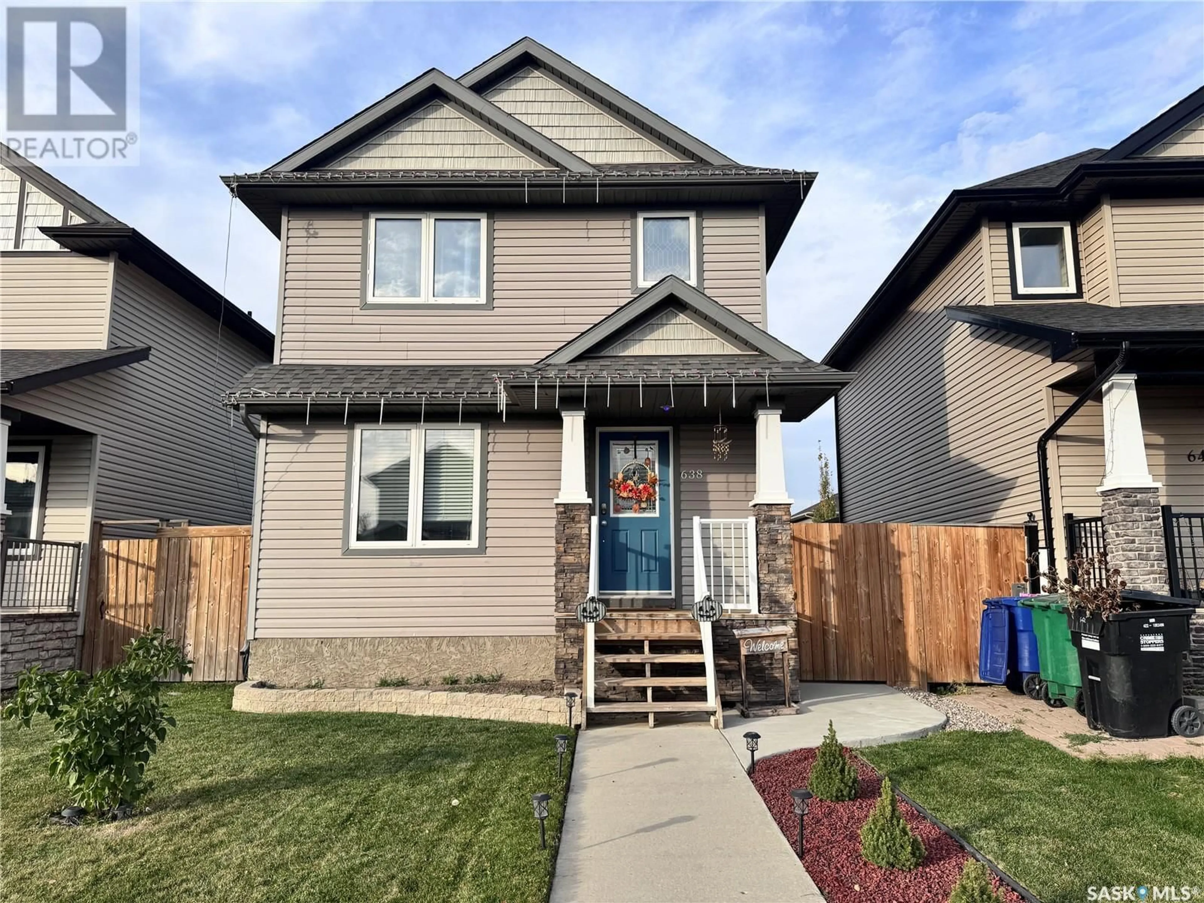 Frontside or backside of a home, the fenced backyard for 638 Hampton CIRCLE, Saskatoon Saskatchewan S7R0G4