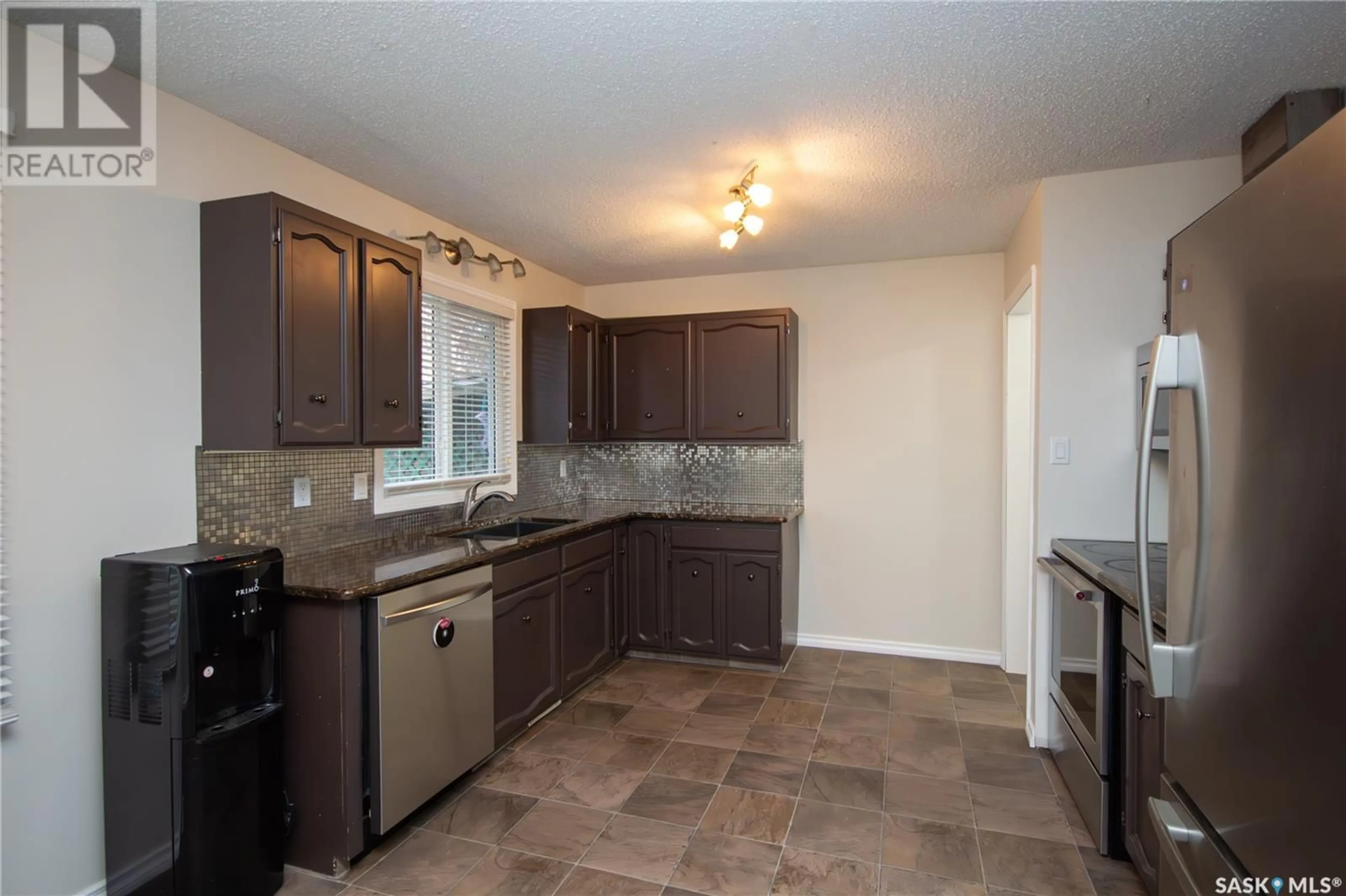 Standard kitchen, wood floors, cottage for 8908 Abbott AVENUE, North Battleford Saskatchewan S9A3H6