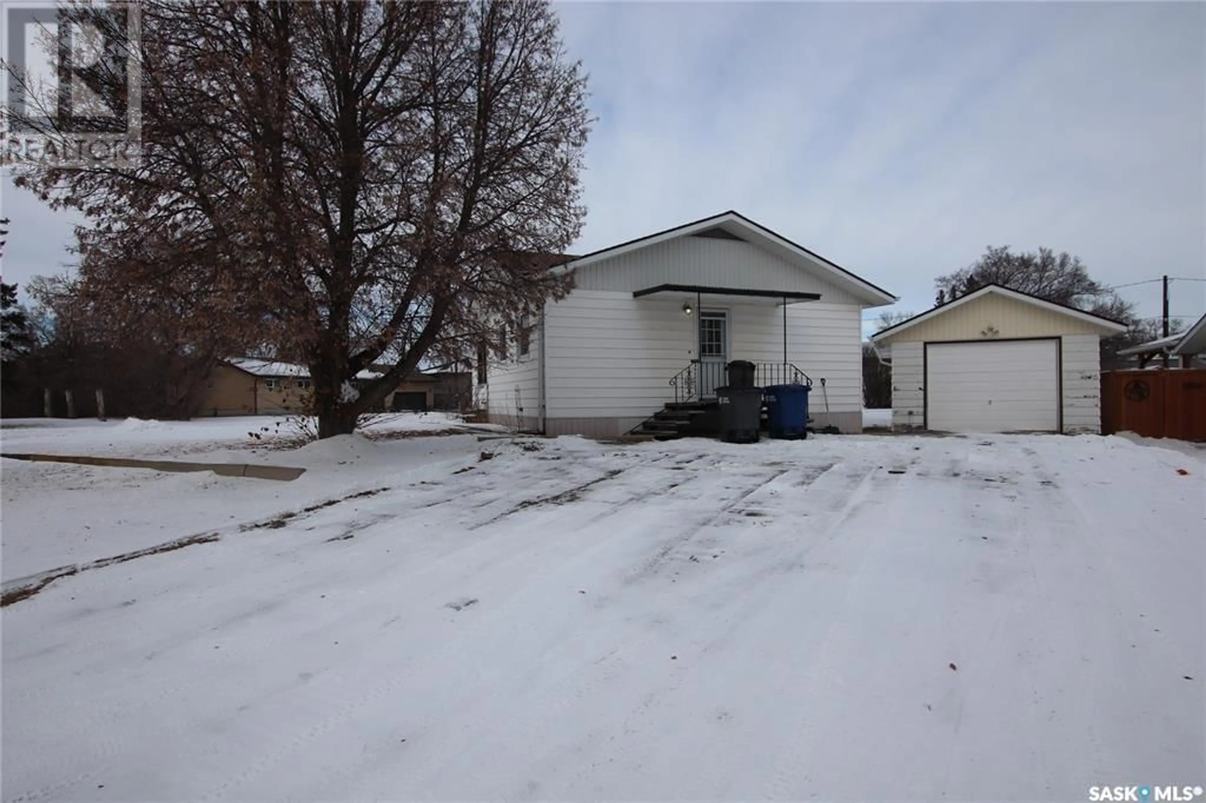 Frontside or backside of a home, the street view for 701 4TH AVENUE, Raymore Saskatchewan S0A3J0