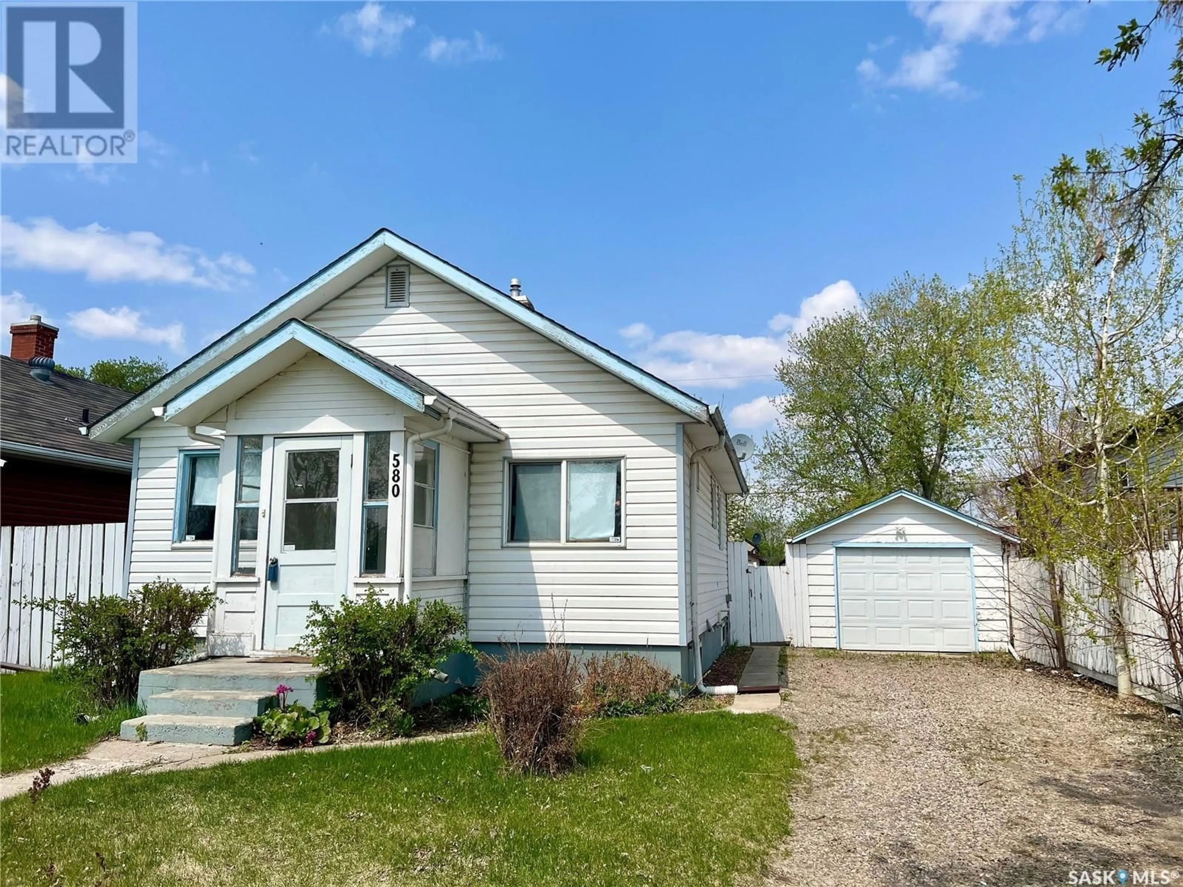 Home with vinyl exterior material, street for 580 11TH STREET, Prince Albert Saskatchewan S6V1A9