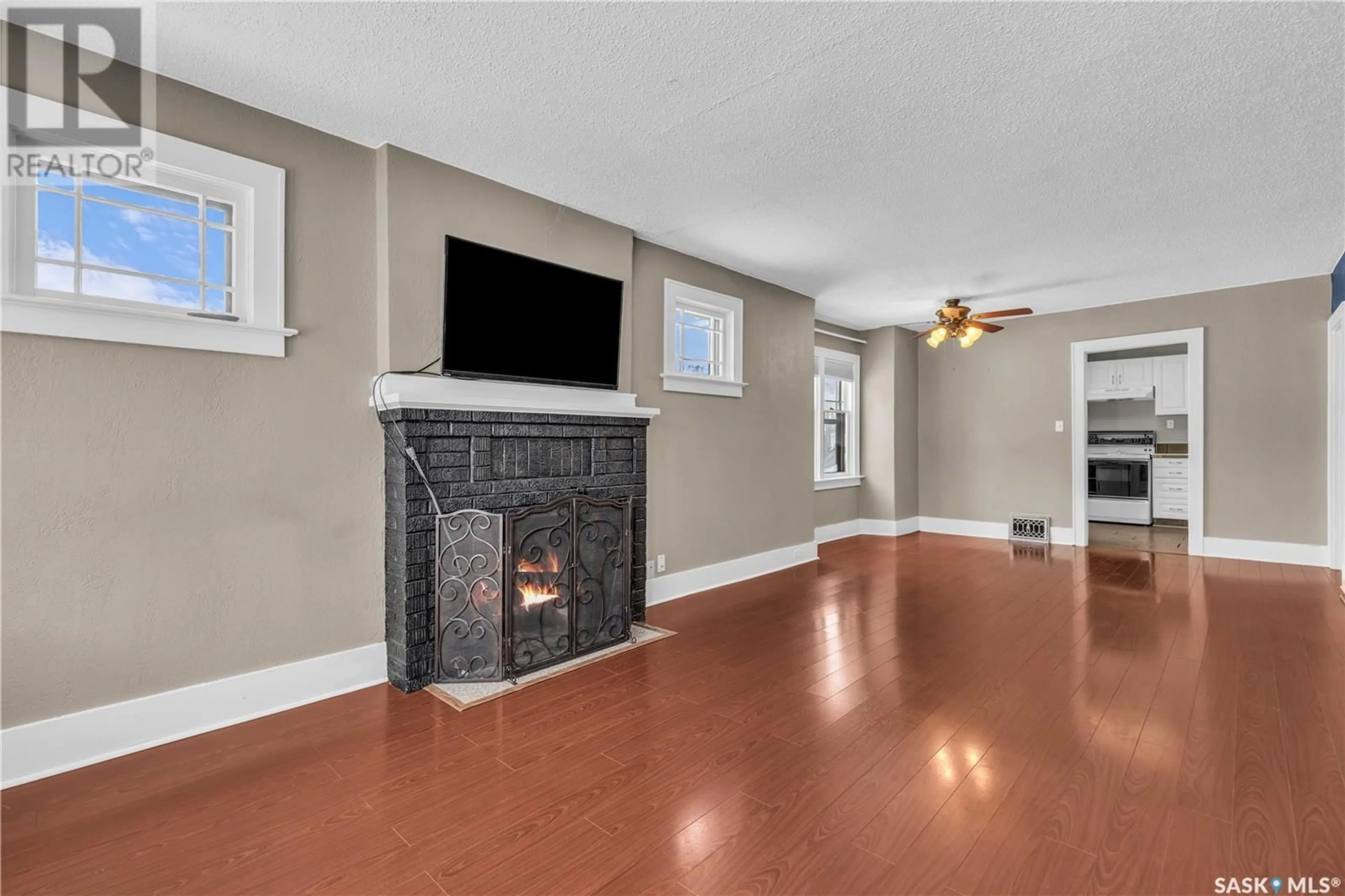 Living room, wood floors for 201 29th STREET W, Saskatoon Saskatchewan S7L0L8