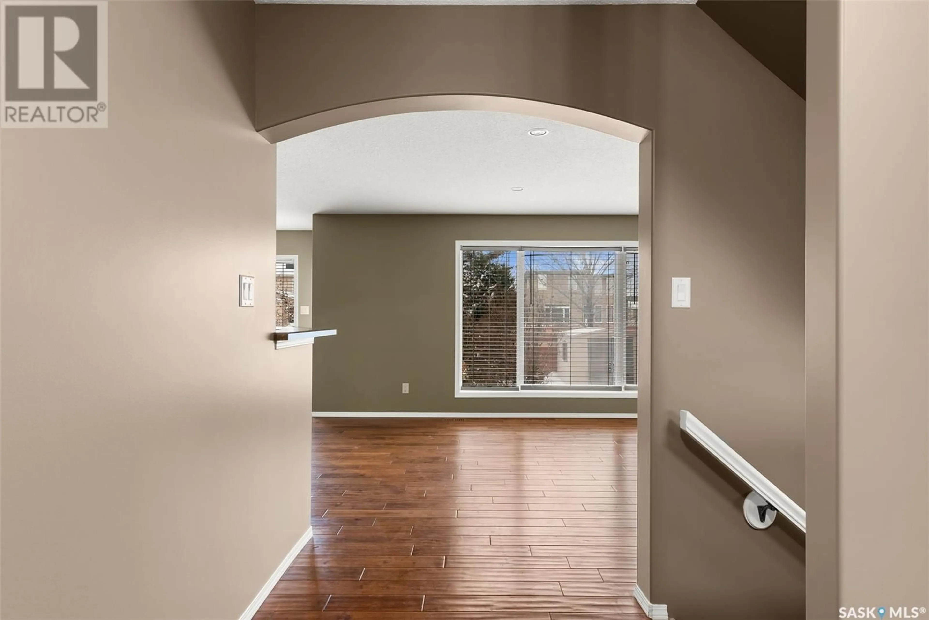 Indoor entryway, wood floors for 7210 Wascana Cove WAY, Regina Saskatchewan S4V3G2