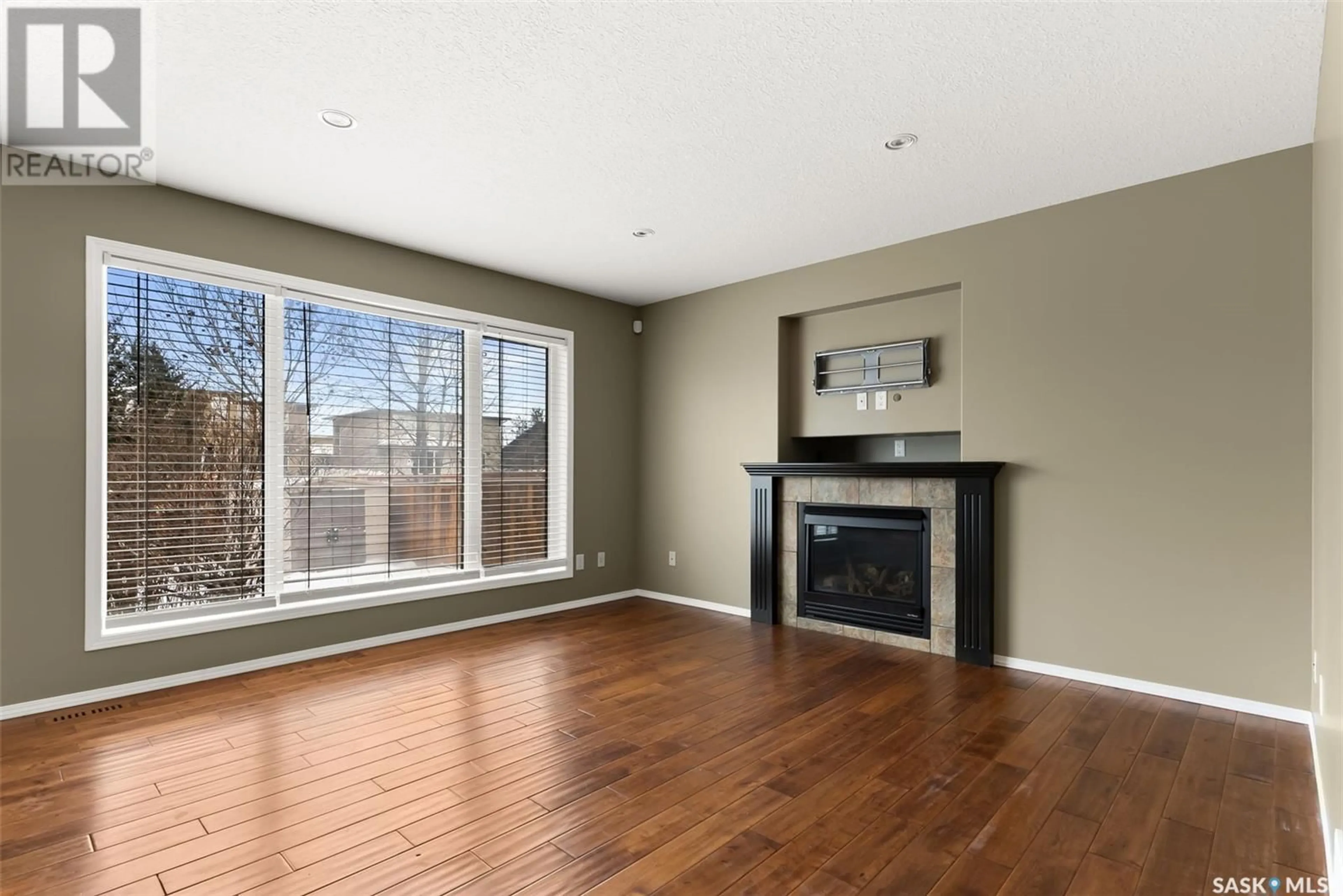 A pic of a room, wood floors for 7210 Wascana Cove WAY, Regina Saskatchewan S4V3G2