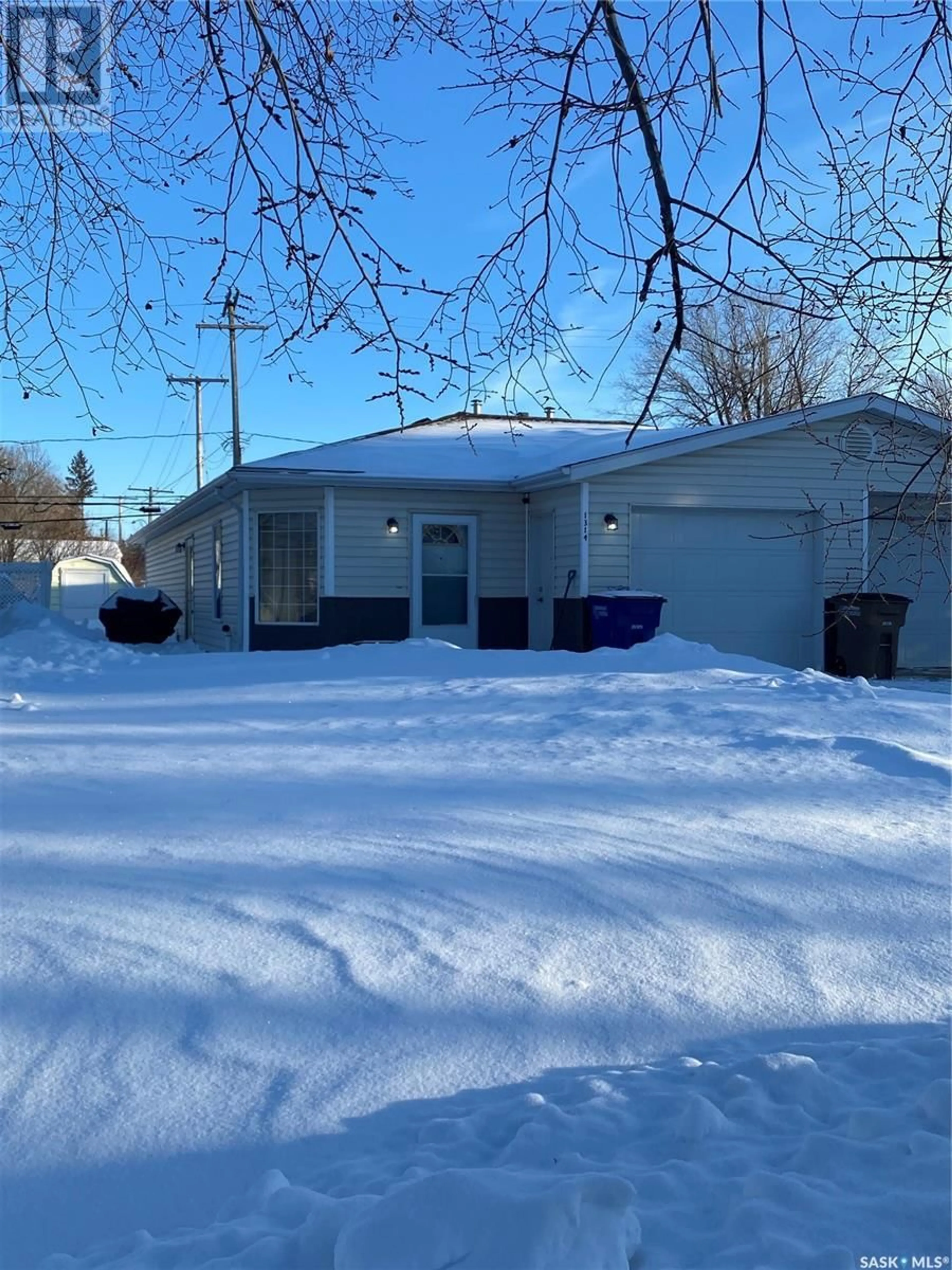 A pic from exterior of the house or condo, the front or back of building for 1314 97th STREET, Tisdale Saskatchewan S0E1T0