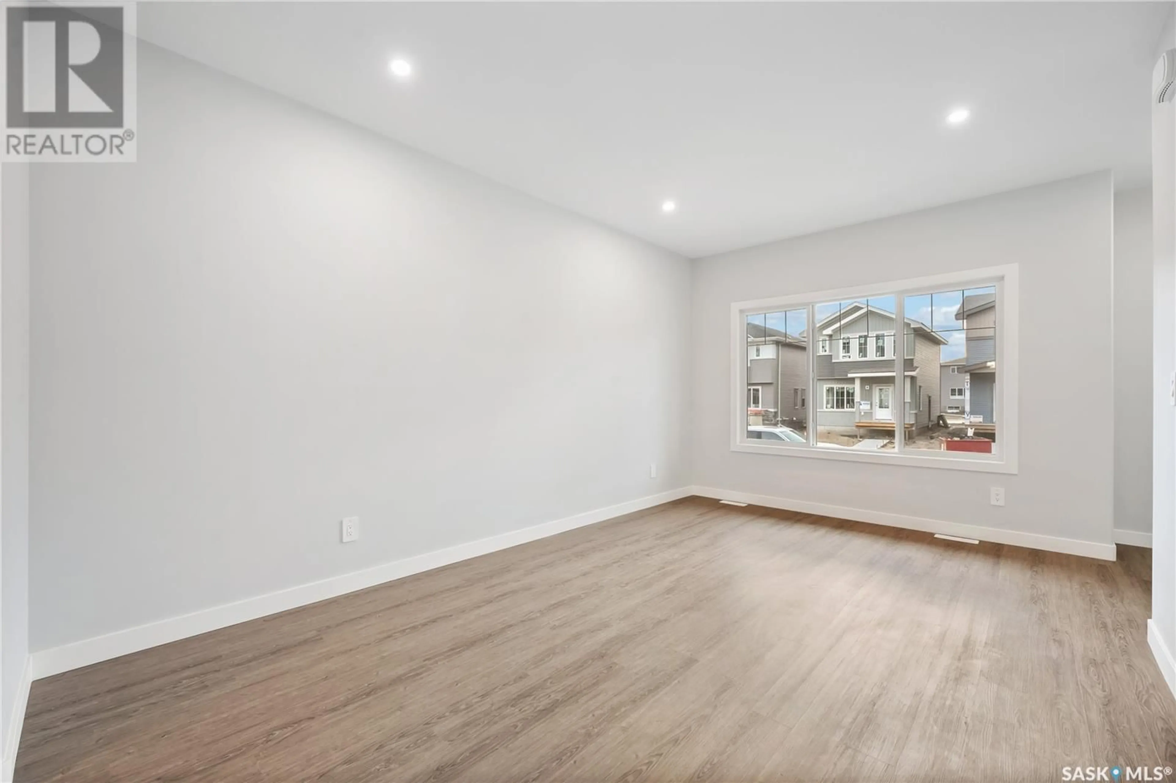 A pic of a room, wood floors for 167 Kostiuk CRESCENT, Saskatoon Saskatchewan S7V1R7