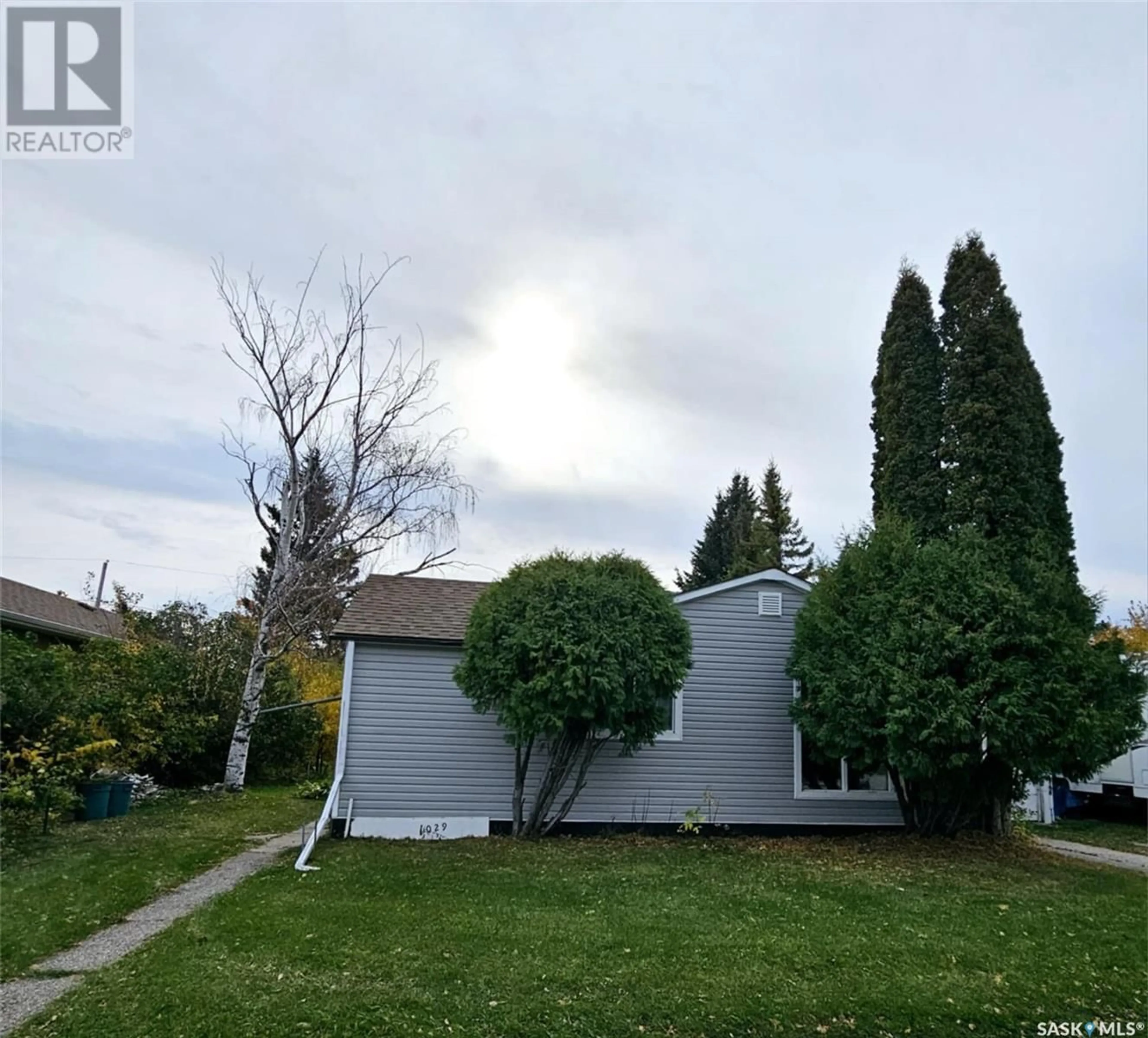 Frontside or backside of a home, the fenced backyard for 1029 Veterans AVENUE, Esterhazy Saskatchewan S0A0X0