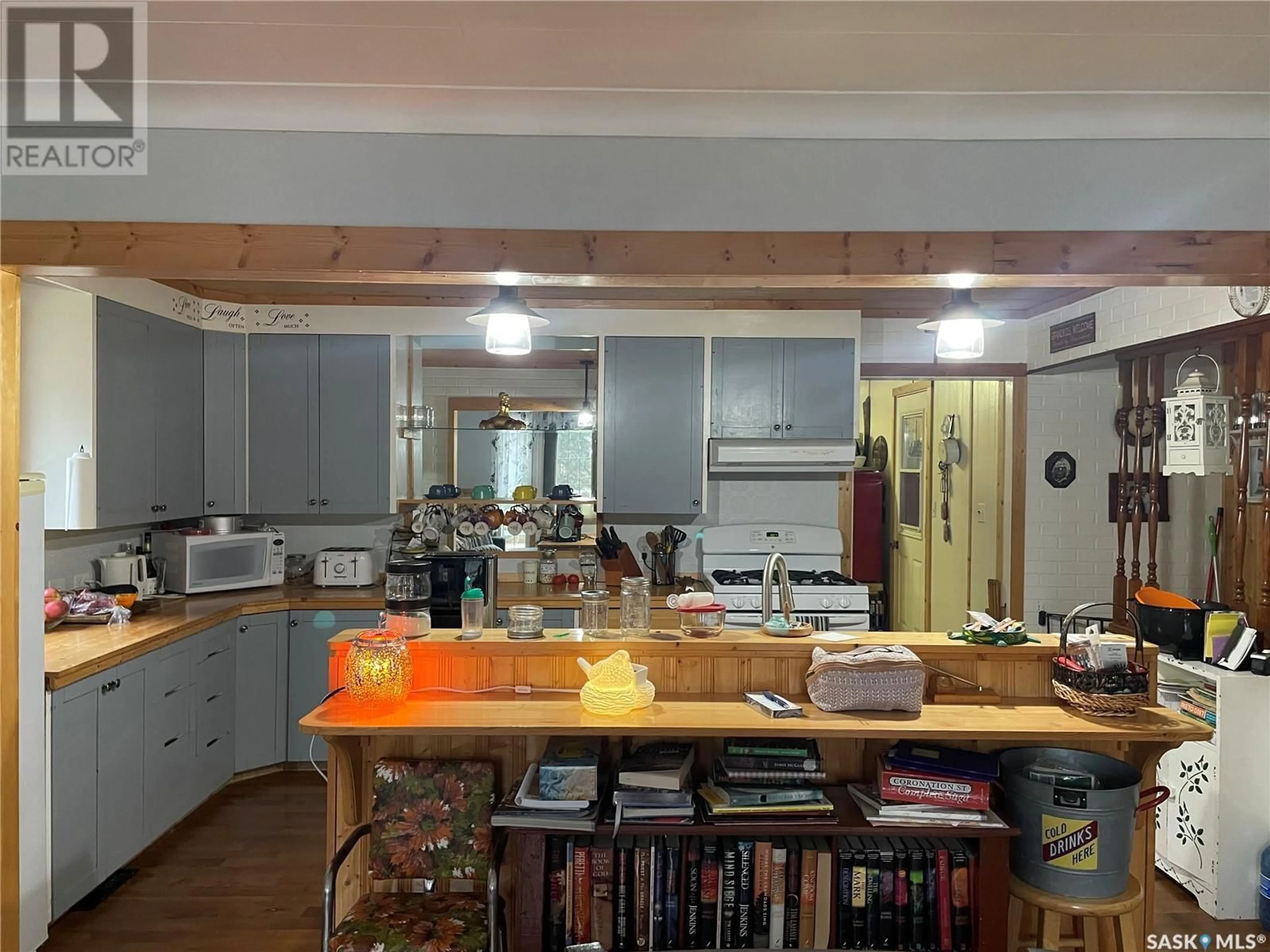Open concept kitchen, wood/laminate floor for 50 ACRES, Makwa Saskatchewan S0M1N0