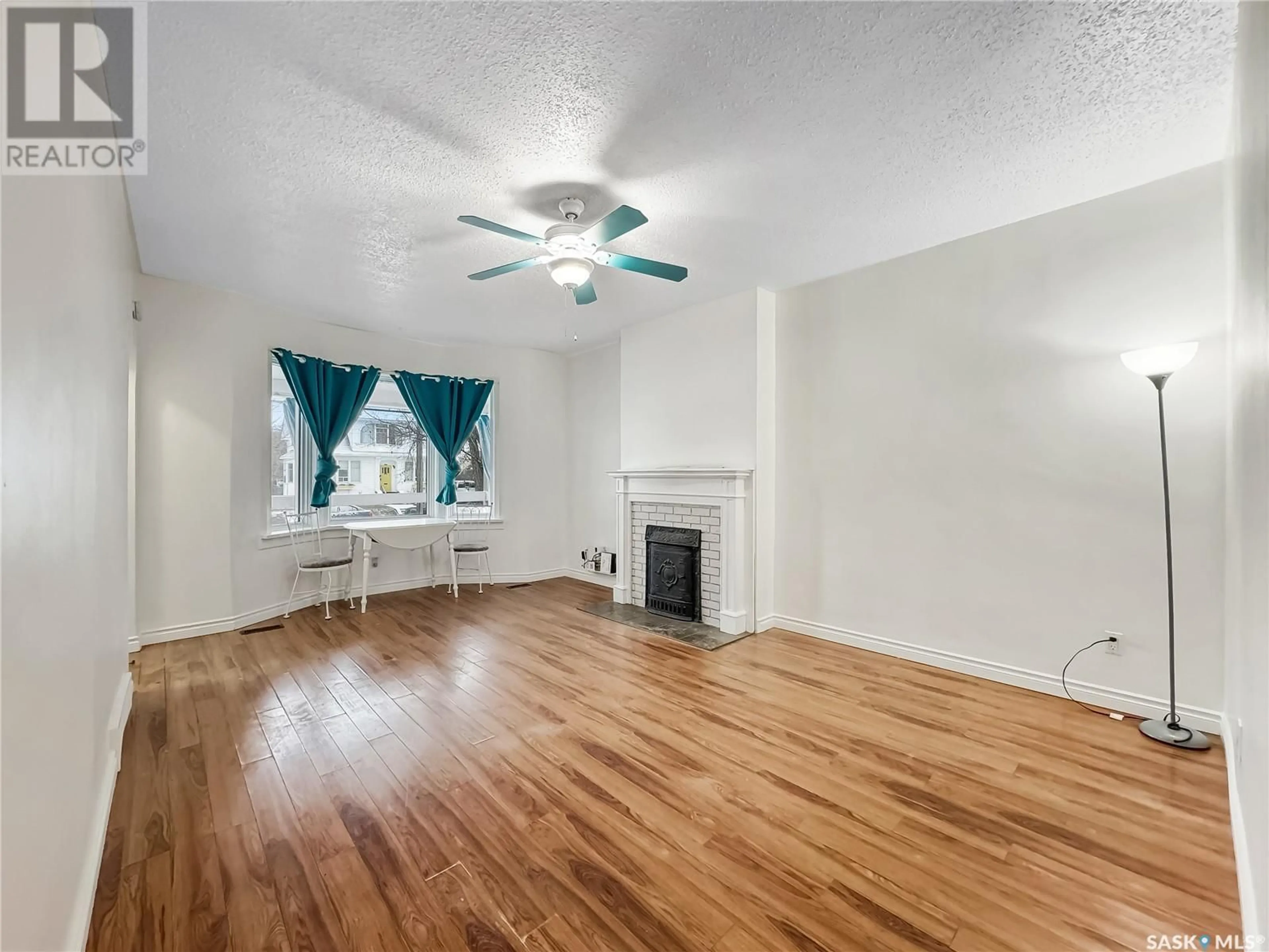 A pic of a room, wood floors for 1452 99th STREET, North Battleford Saskatchewan S9A0R1