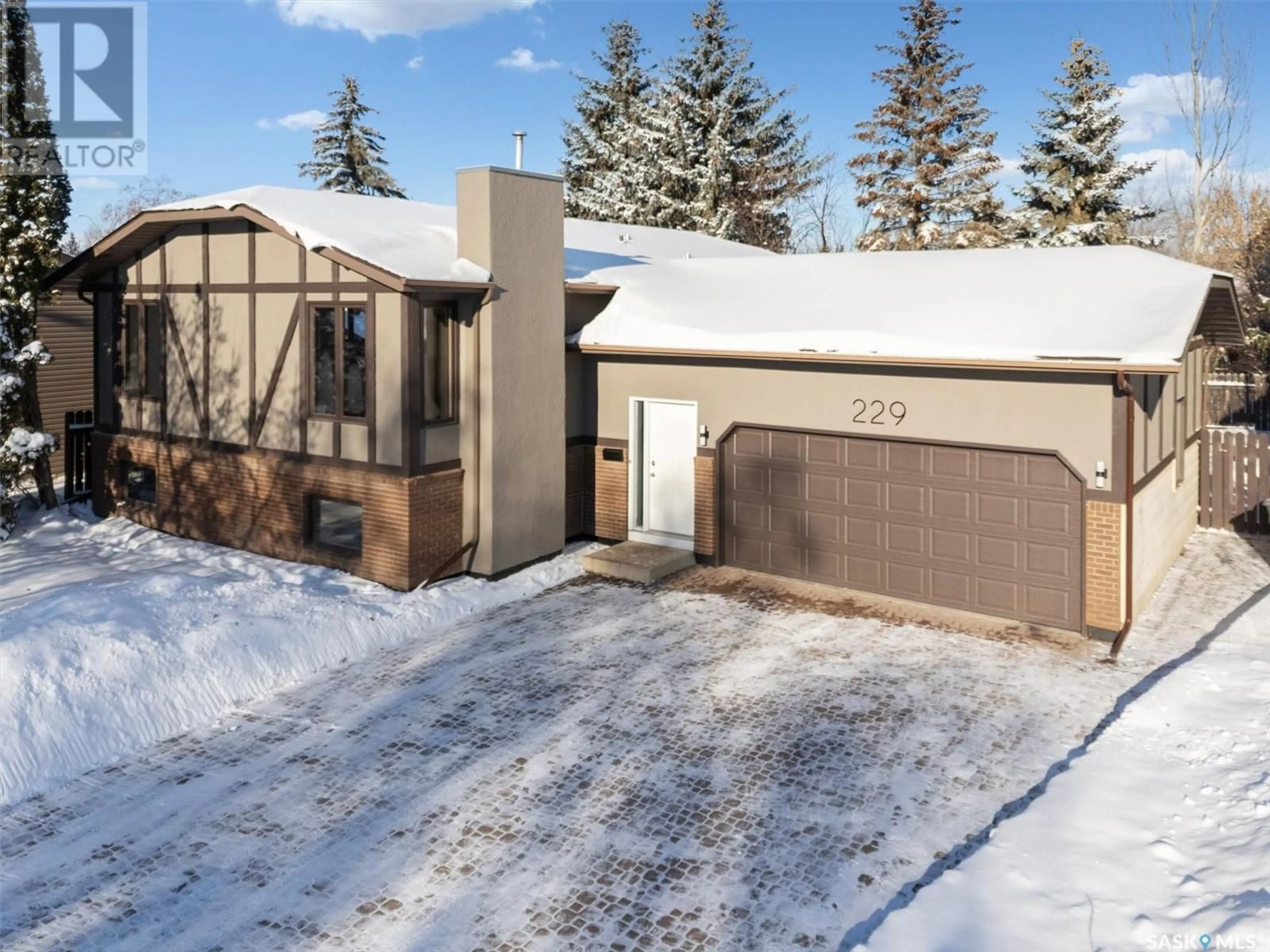 A pic from exterior of the house or condo, the street view for 229 Badger COURT, Saskatoon Saskatchewan S7N2X2