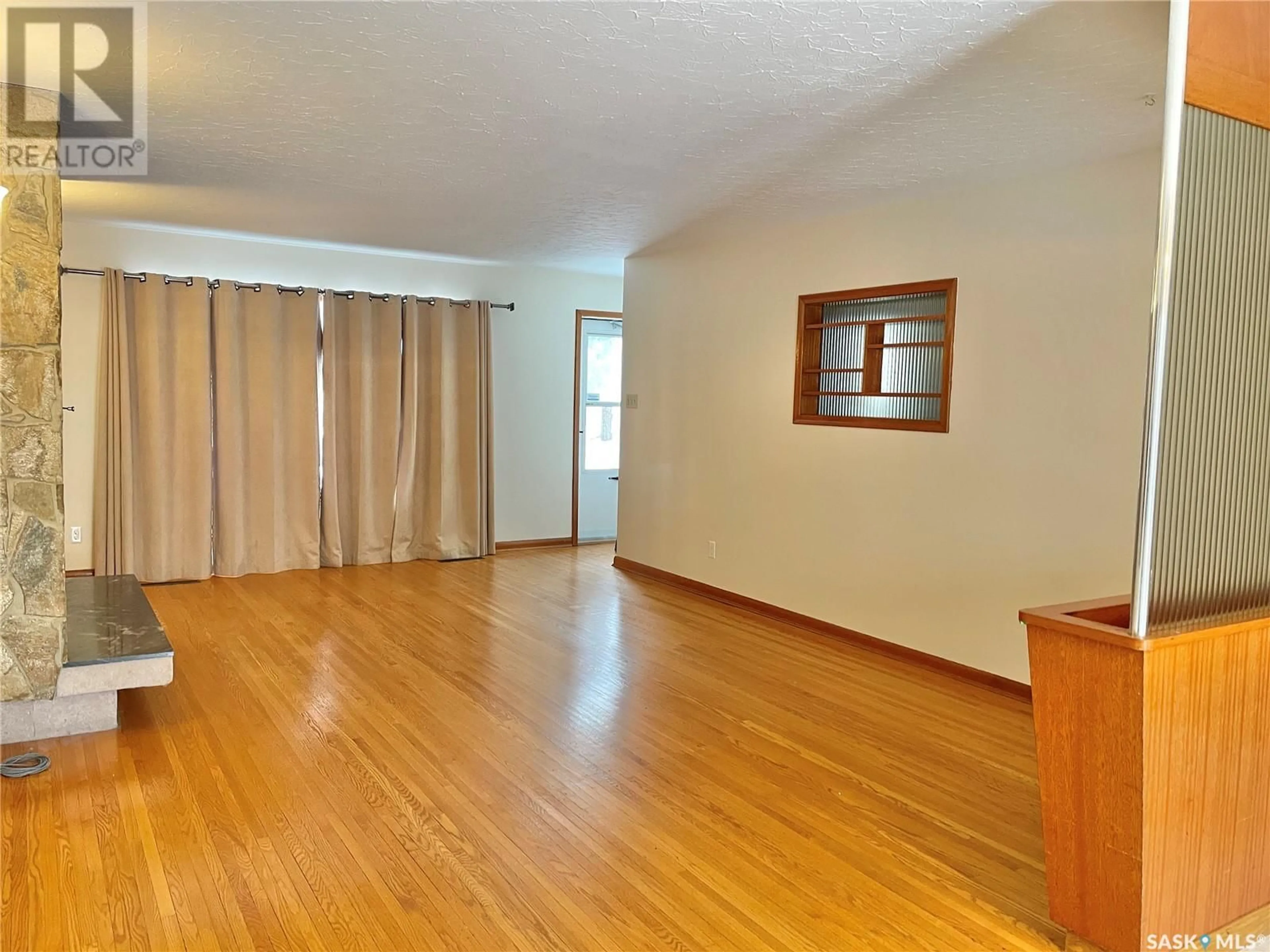 A pic of a room, wood floors for 422 R AVENUE N, Saskatoon Saskatchewan S7L2Y9