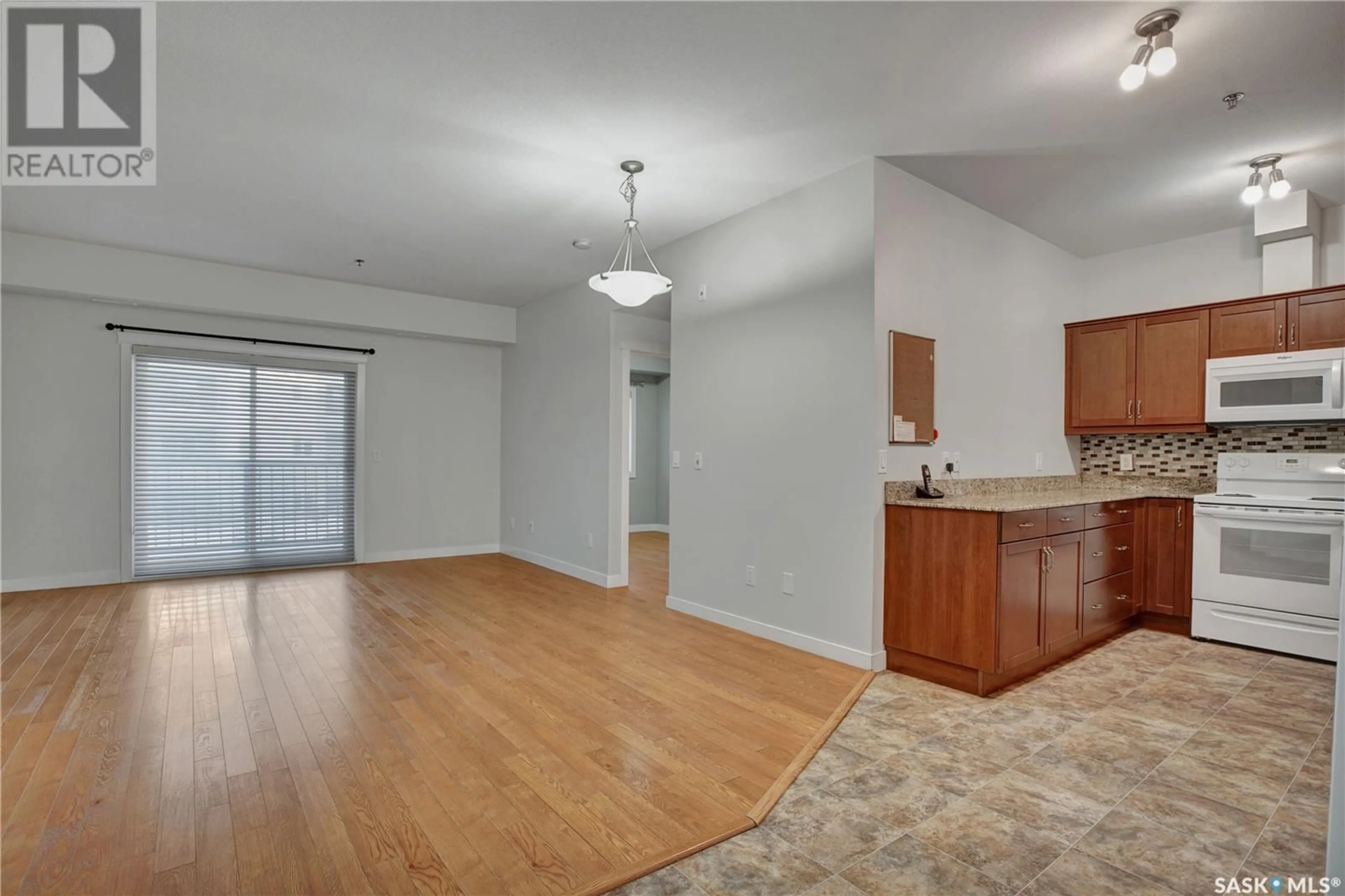 A pic of a room, wood floors for 210 106 Hampton CIRCLE, Saskatoon Saskatchewan S7R0C4