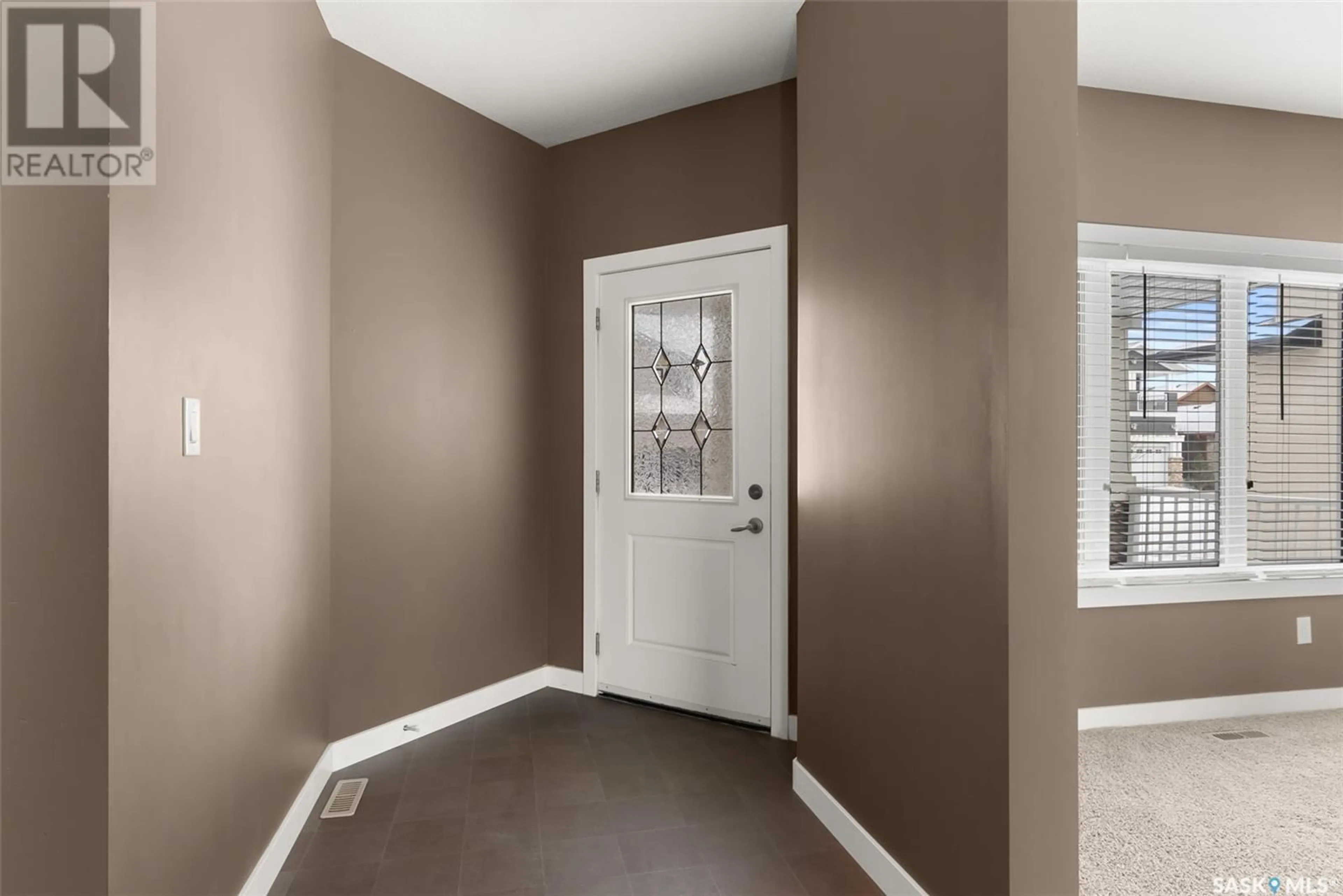 Indoor entryway, wood floors for 5277 AVIATOR CRESCENT, Regina Saskatchewan S0G4G0