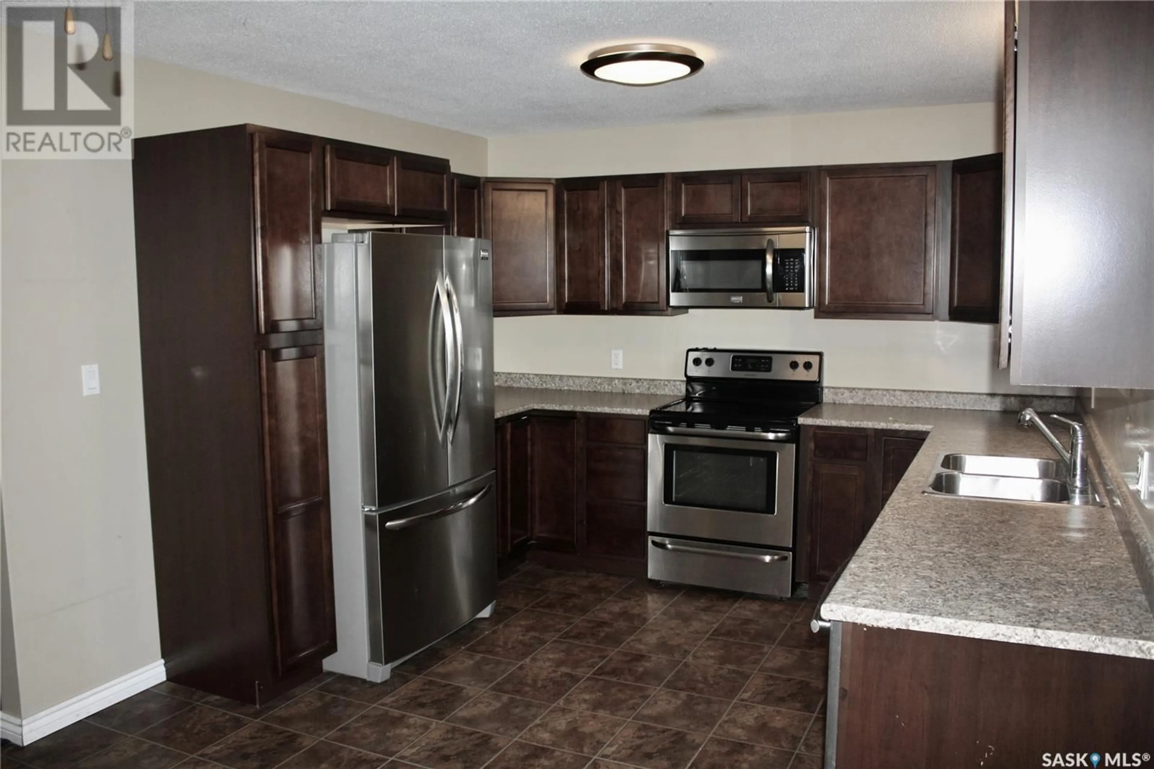 Standard kitchen, wood floors, cottage for 609 Kintyre AVENUE, Colonsay Saskatchewan S0K0Z0