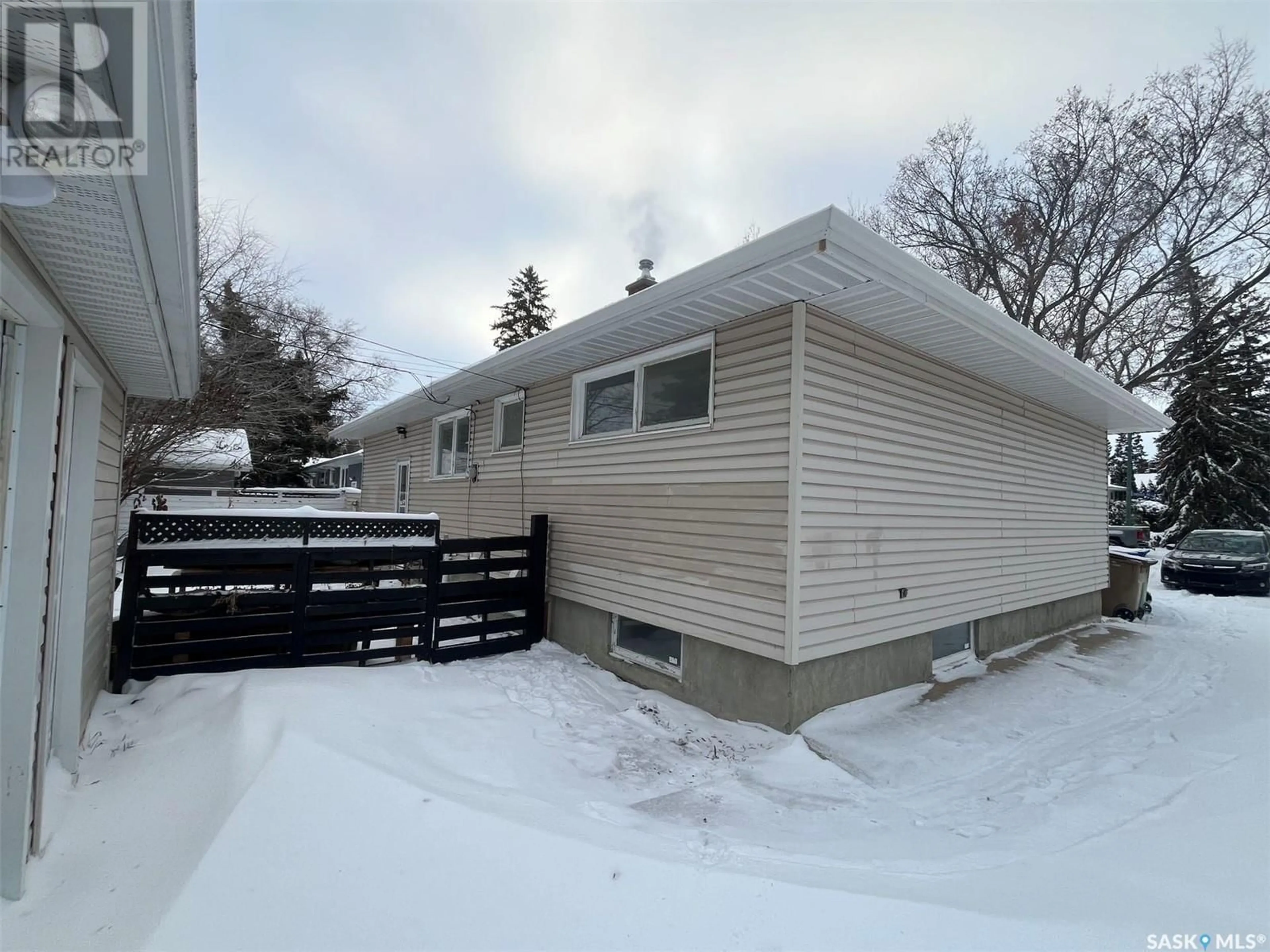 Frontside or backside of a home, the front or back of building for 8 Emerald Park ROAD, Regina Saskatchewan S4S4X5