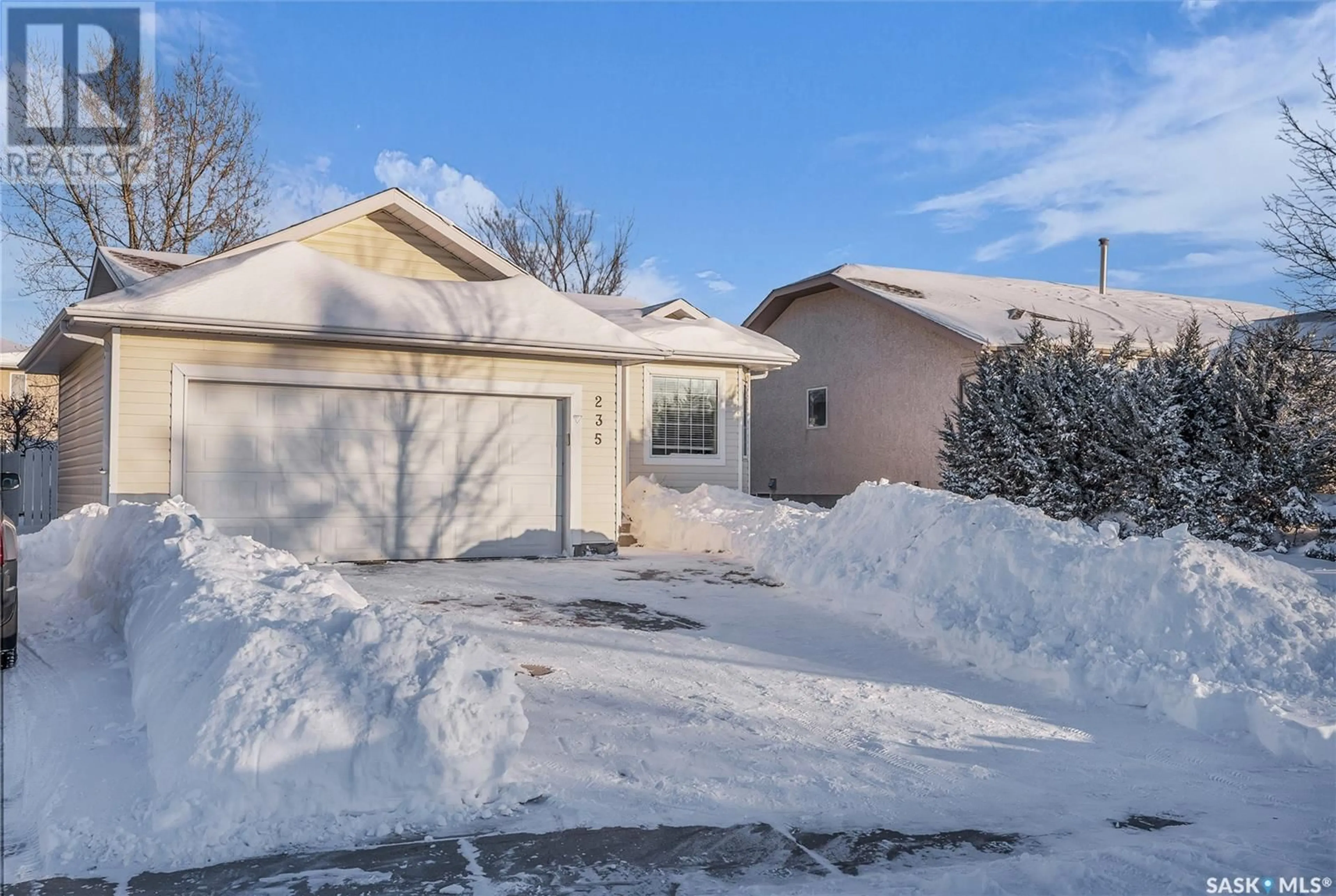 Frontside or backside of a home, the street view for 235 BEERLING CRESCENT, Saskatoon Saskatchewan S7S1K4