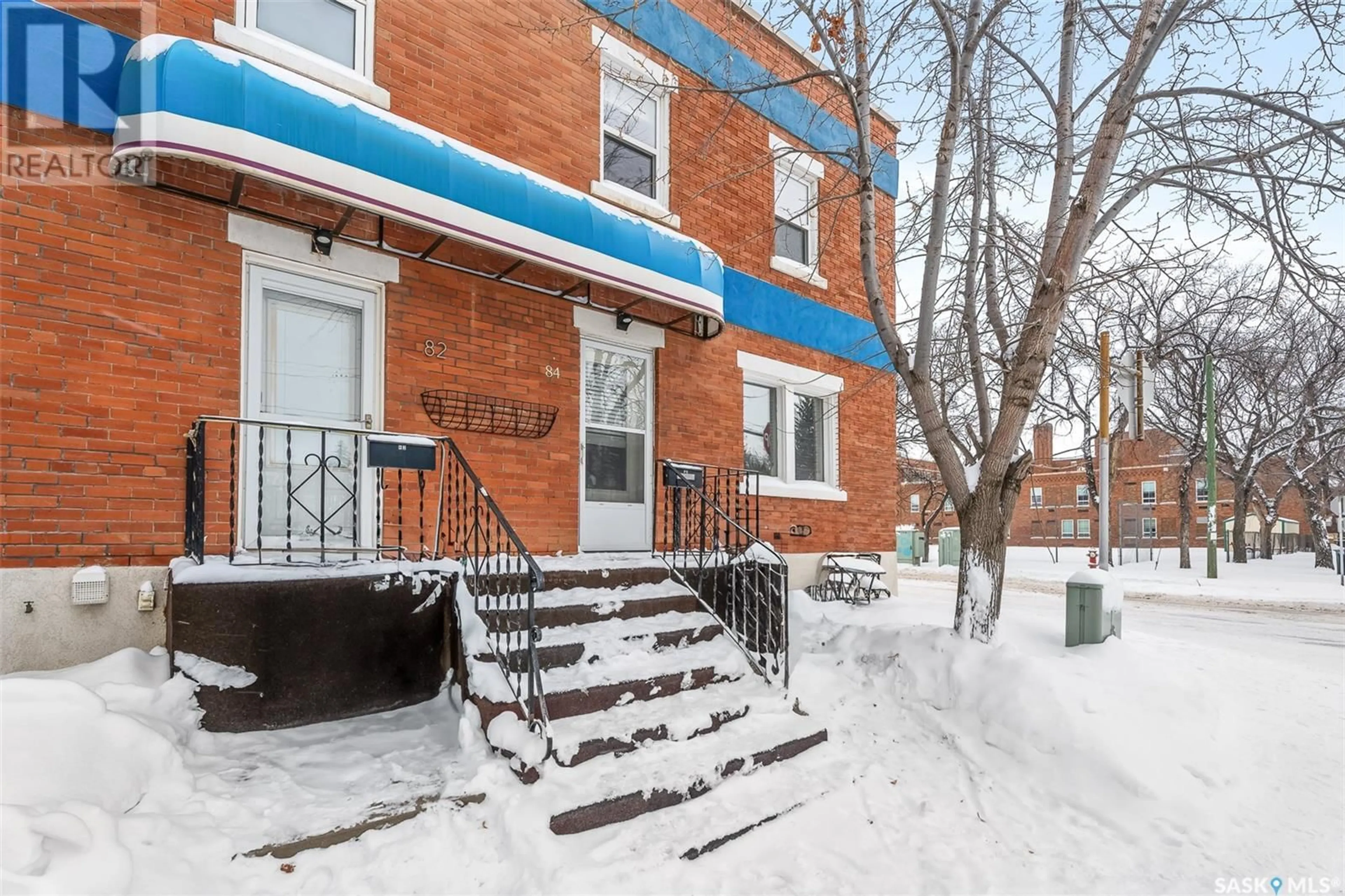 A pic from exterior of the house or condo, the street view for 84 Caribou STREET E, Moose Jaw Saskatchewan S6H0R3