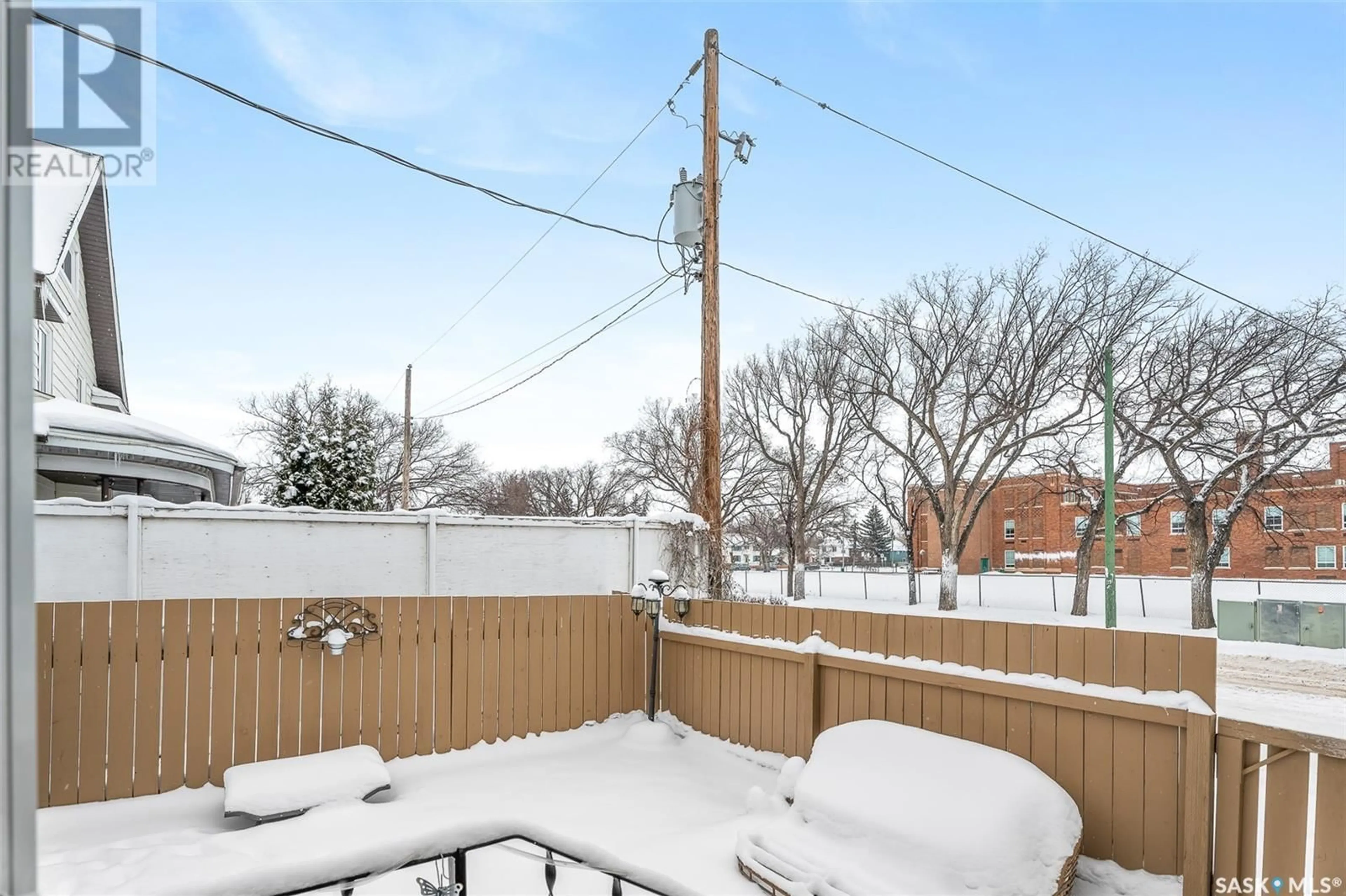 Patio, the fenced backyard for 84 Caribou STREET E, Moose Jaw Saskatchewan S6H0R3