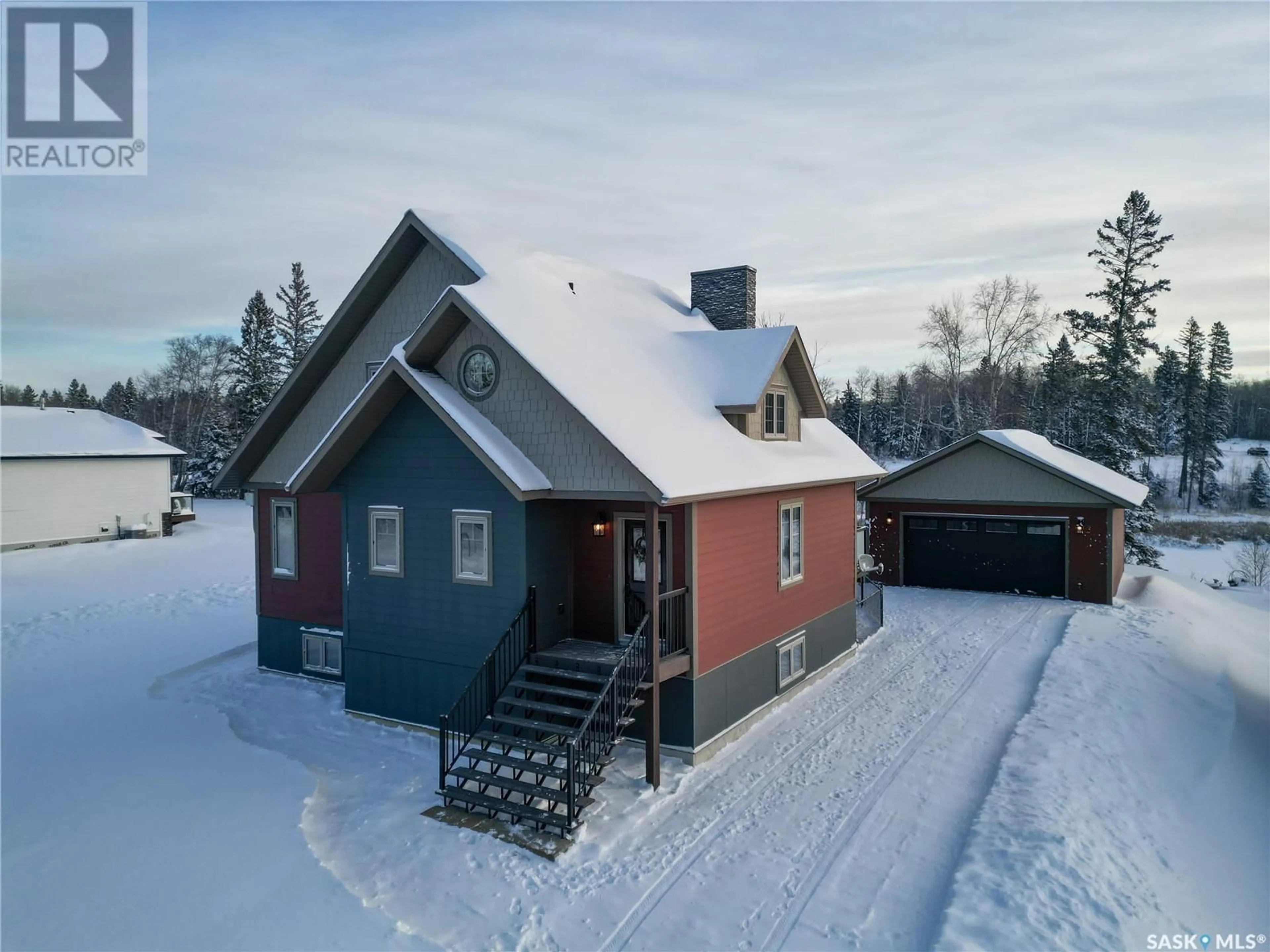A pic from outside/outdoor area/front of a property/back of a property/a pic from drone, building for 101 - 8 NEIS ACCESS ROAD, Emma Lake Saskatchewan S0J0N0
