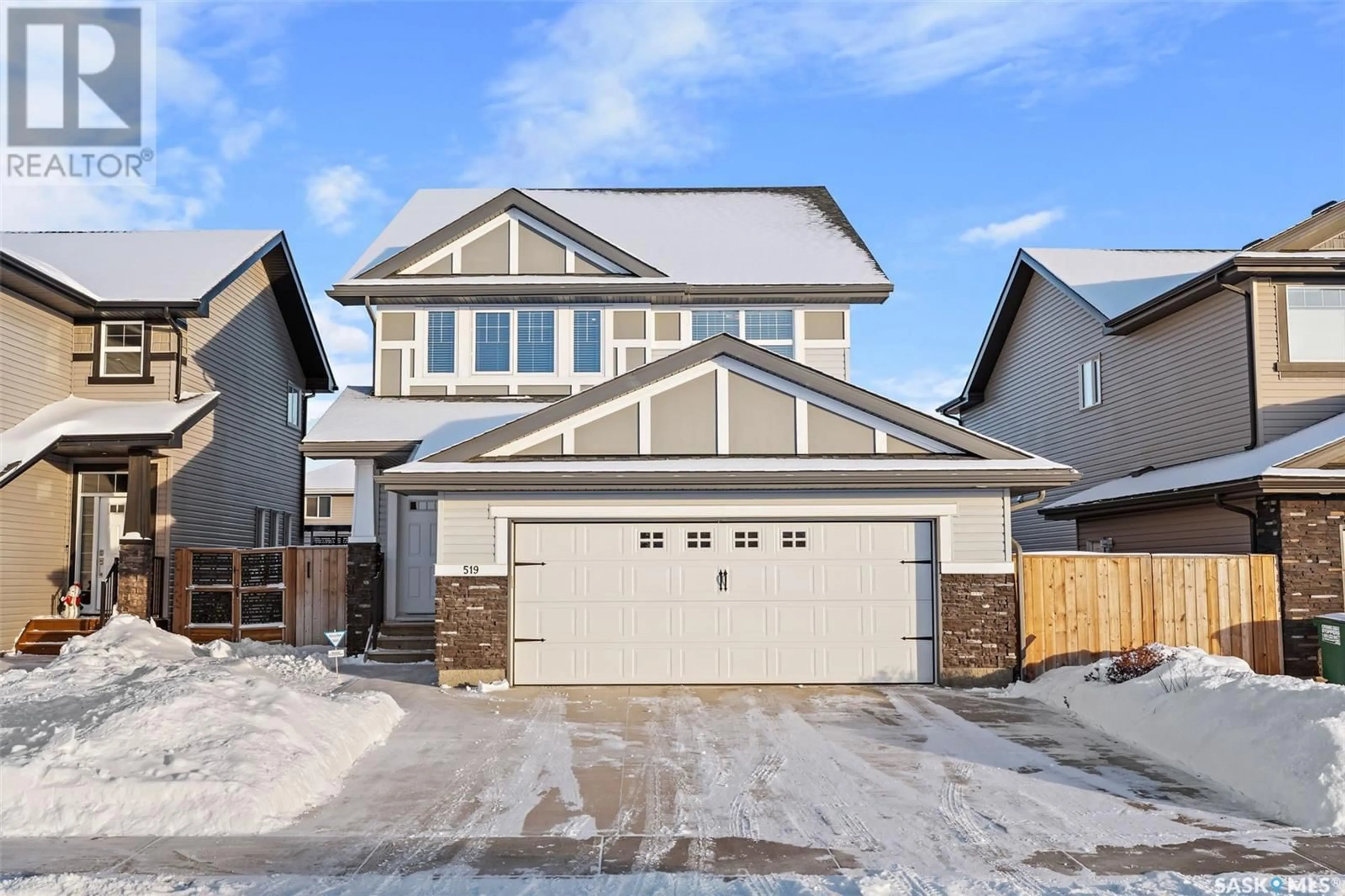 Frontside or backside of a home, the street view for 519 Secord MANOR, Saskatoon Saskatchewan S7V0M1