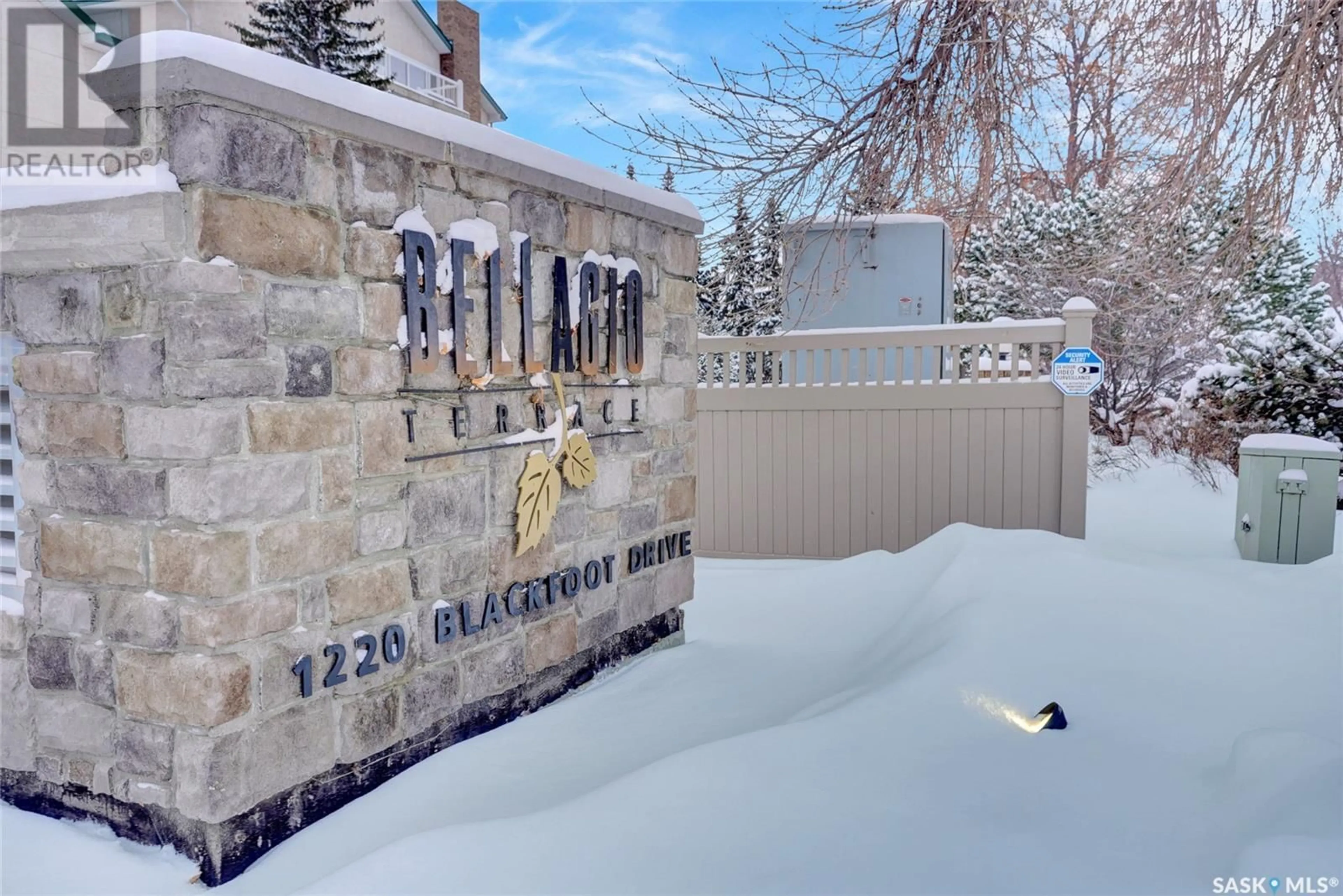 A pic from exterior of the house or condo, the fenced backyard for 208 1220 Blackfoot DRIVE, Regina Saskatchewan S4S6T2