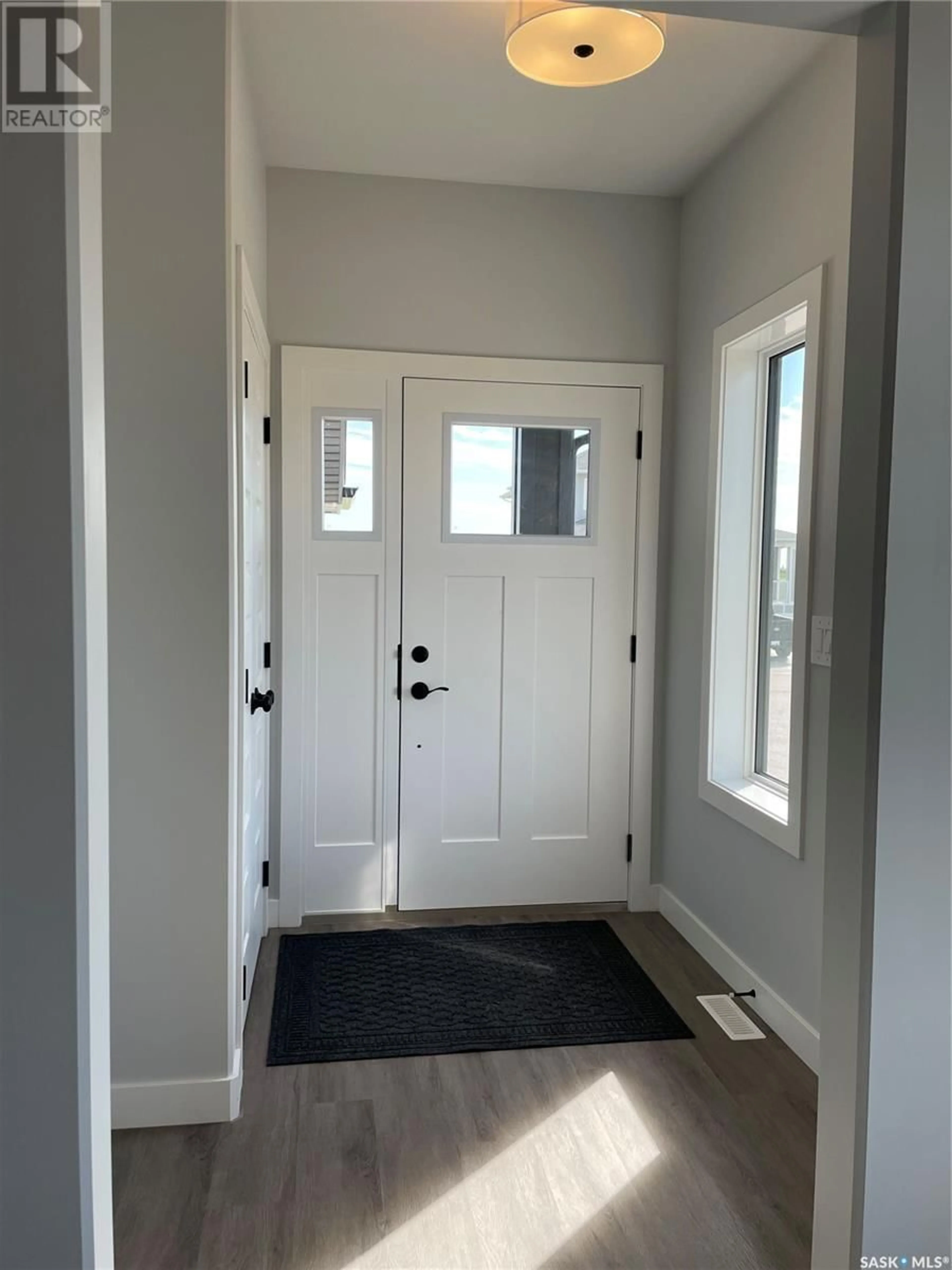 Indoor entryway, wood floors for 503 Myles Heidt MANOR, Saskatoon Saskatchewan S7W1J2