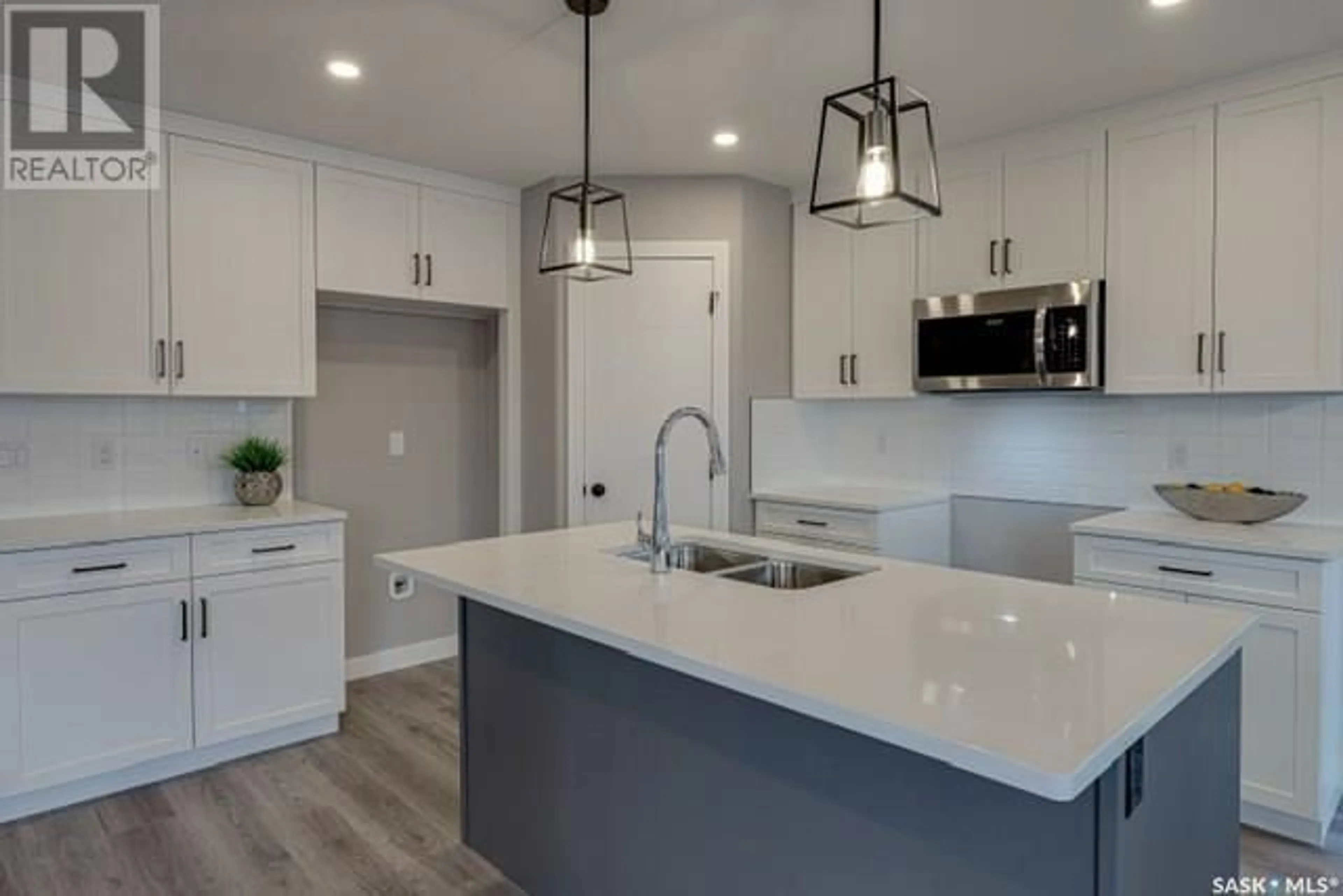 Open concept kitchen for 511 Myles Heidt MANOR, Saskatoon Saskatchewan S7W1J2