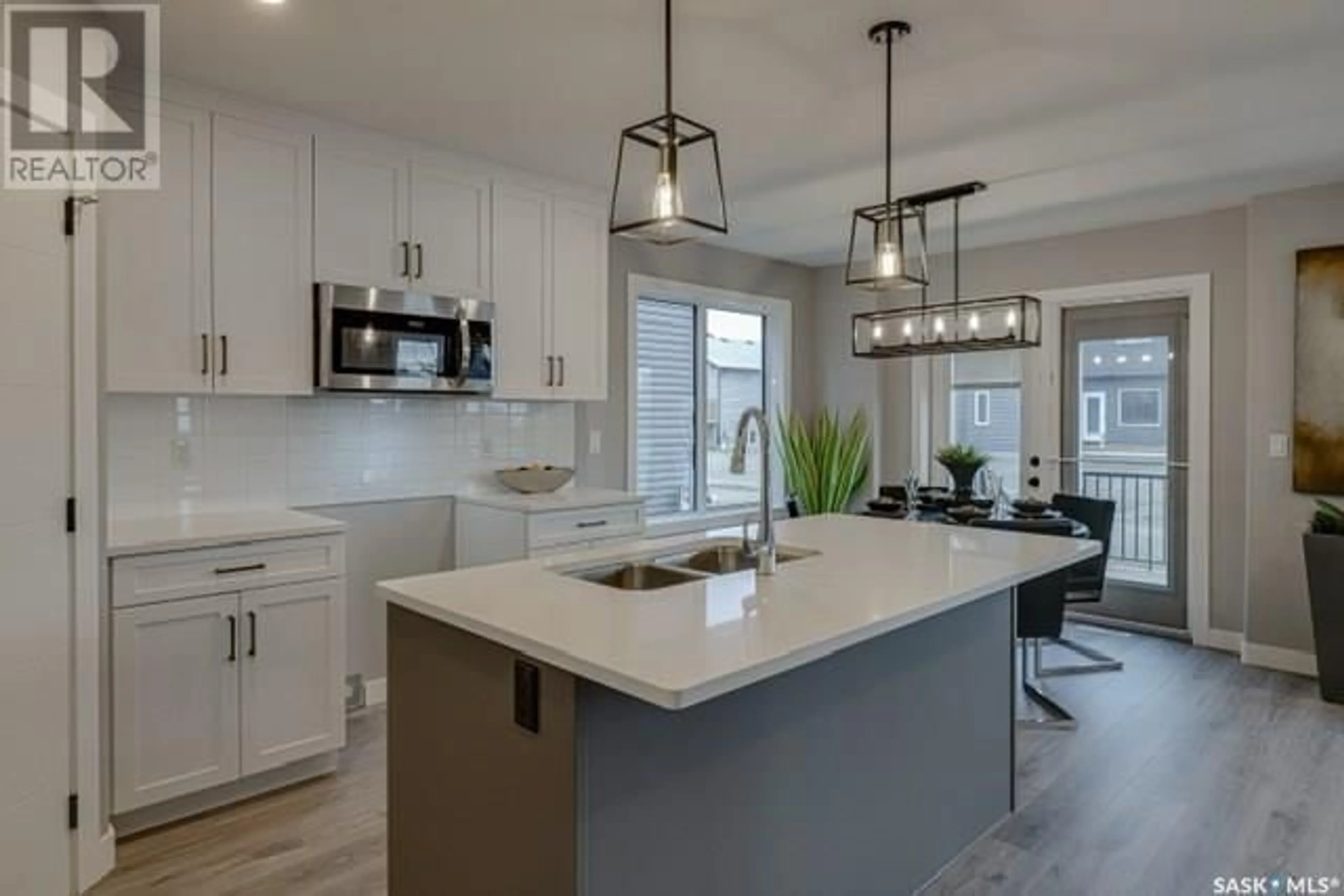 Open concept kitchen for 511 Myles Heidt MANOR, Saskatoon Saskatchewan S7W1J2