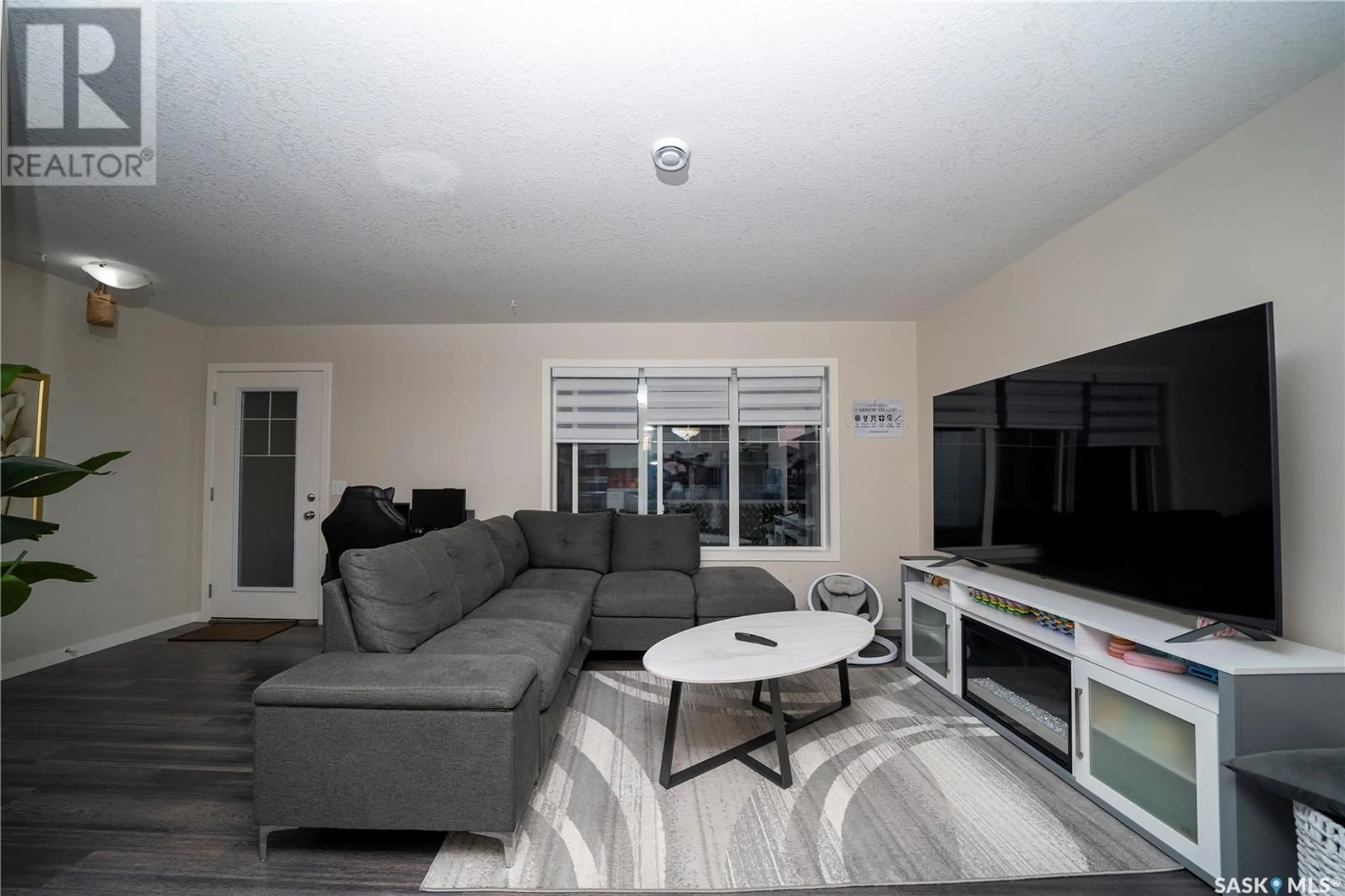 Living room, wood floors for 49B 5635 Aerodrome ROAD, Regina Saskatchewan S4W0M3