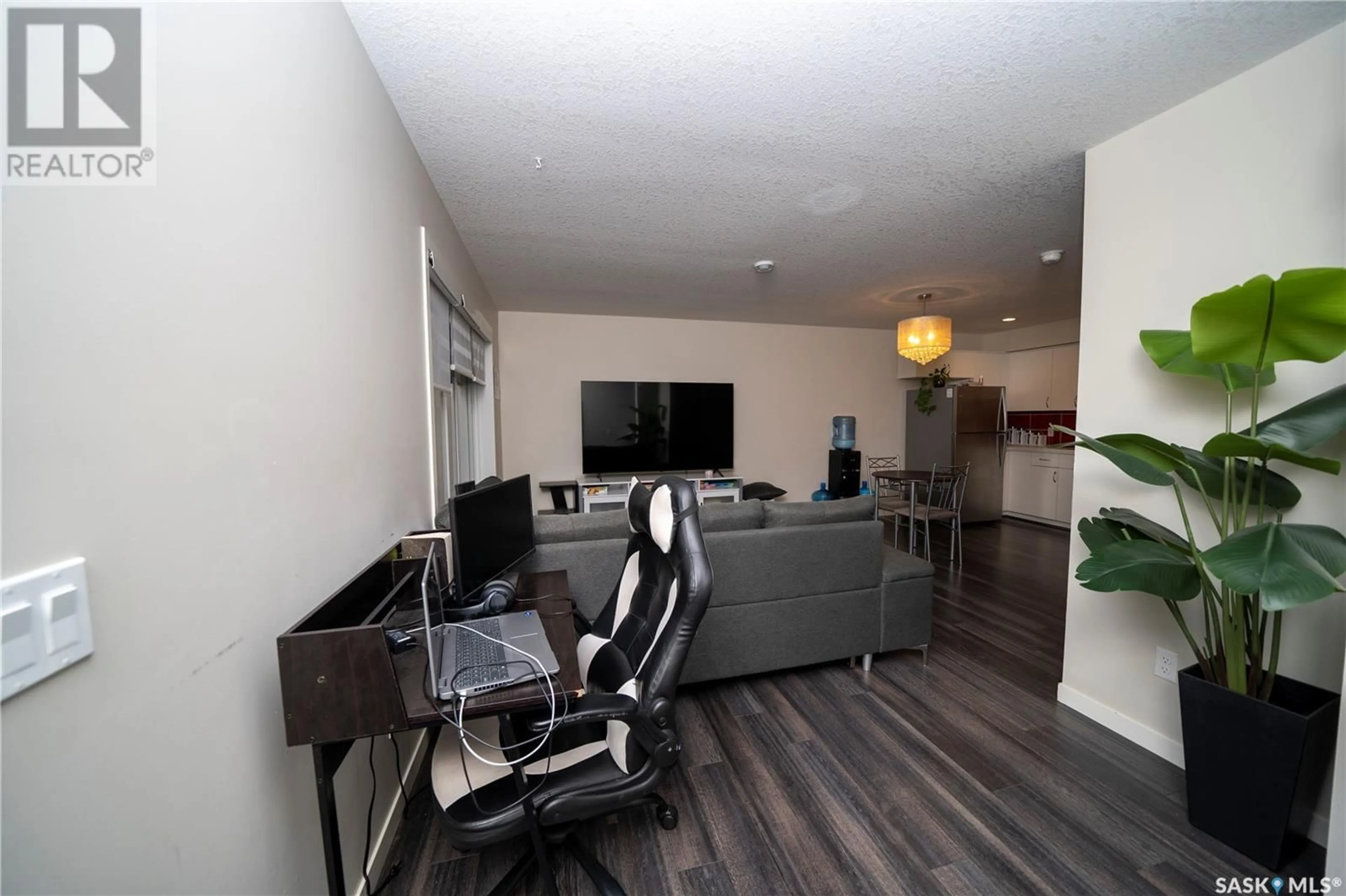 Media room, wood floors for 49B 5635 Aerodrome ROAD, Regina Saskatchewan S4W0M3