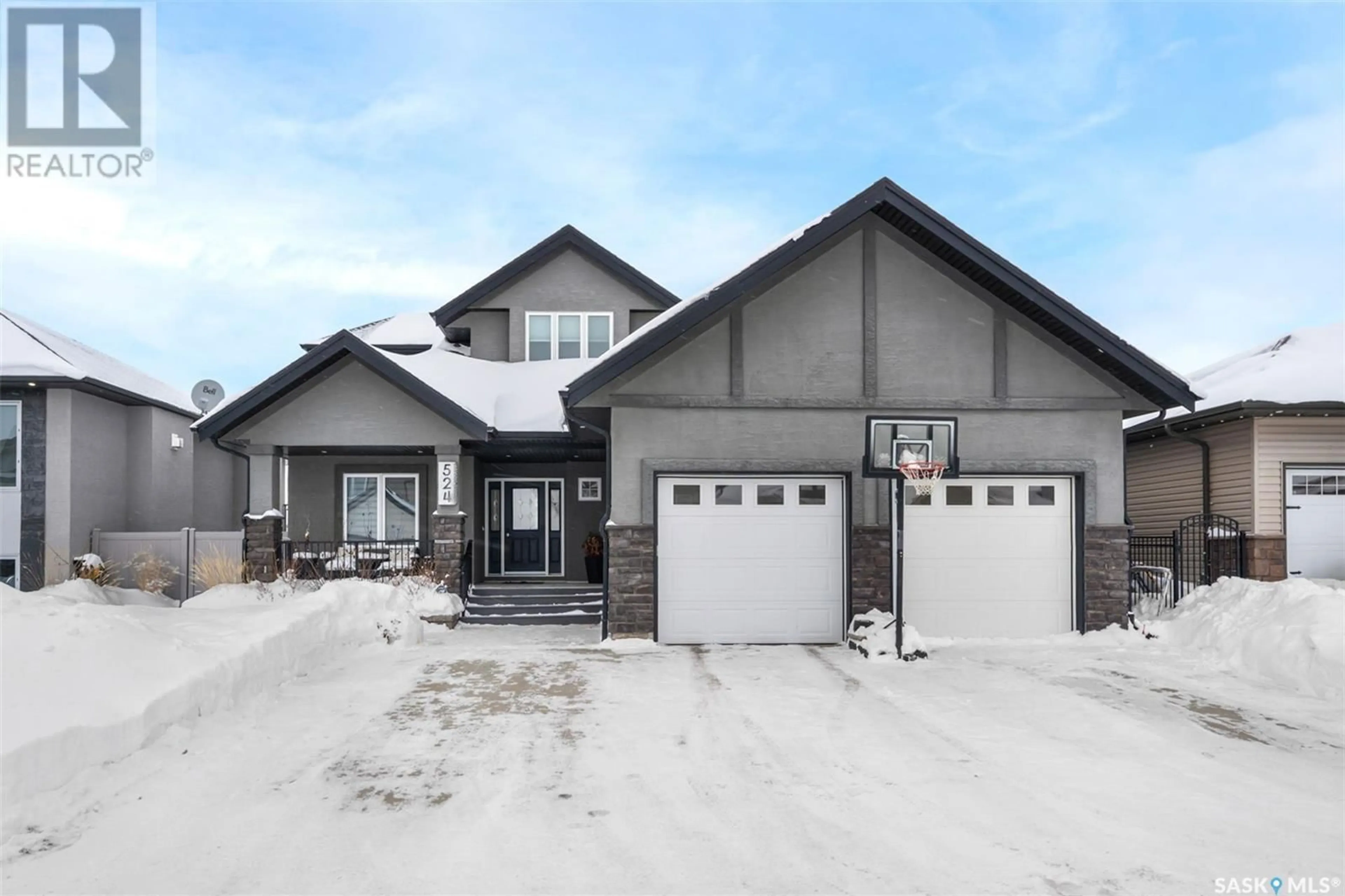 Frontside or backside of a home, cottage for 524 REDWOOD CRESCENT, Warman Saskatchewan S0K4S2