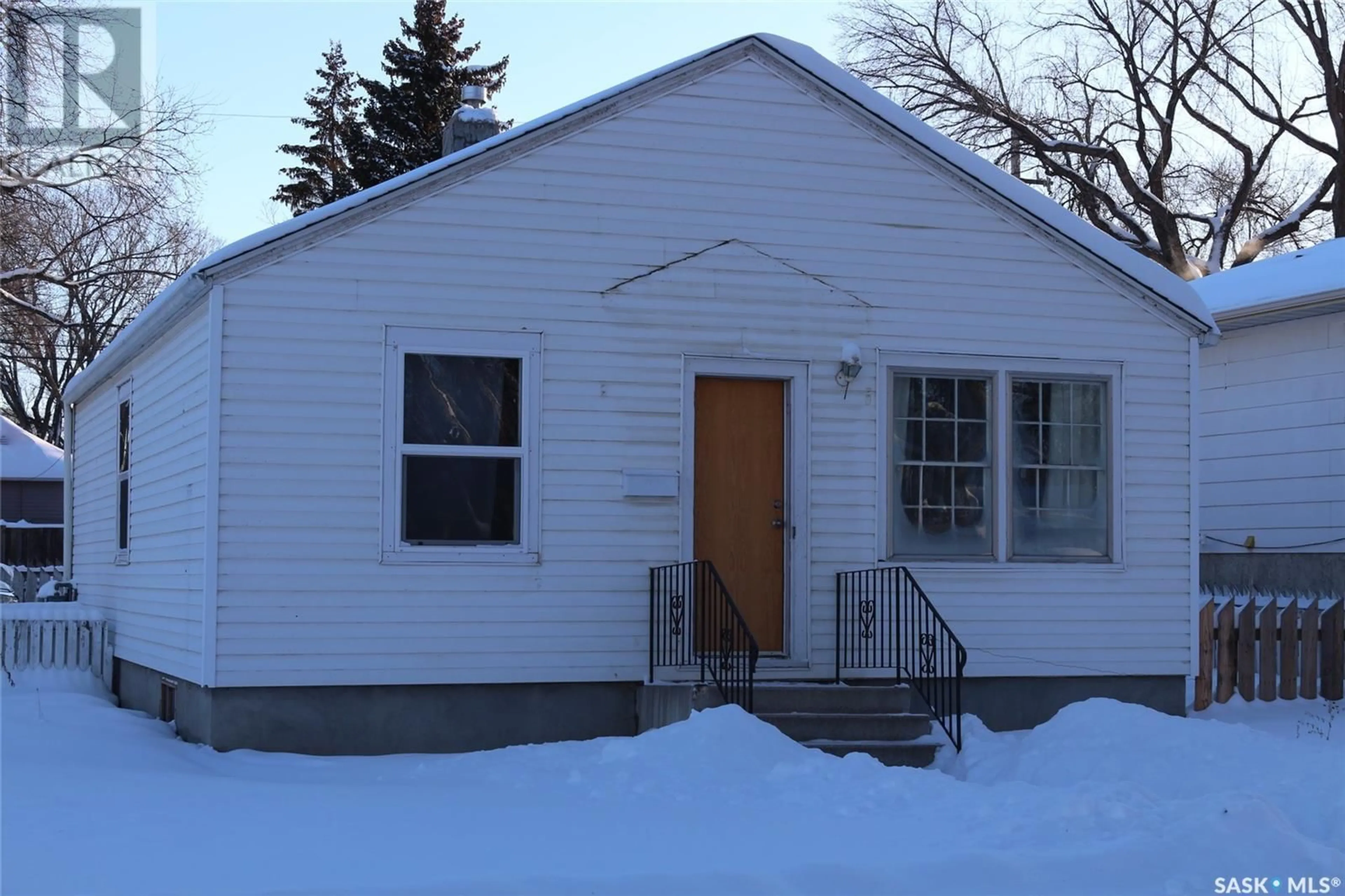 Frontside or backside of a home, the front or back of building for 1438 F AVENUE N, Saskatoon Saskatchewan S7L1X7