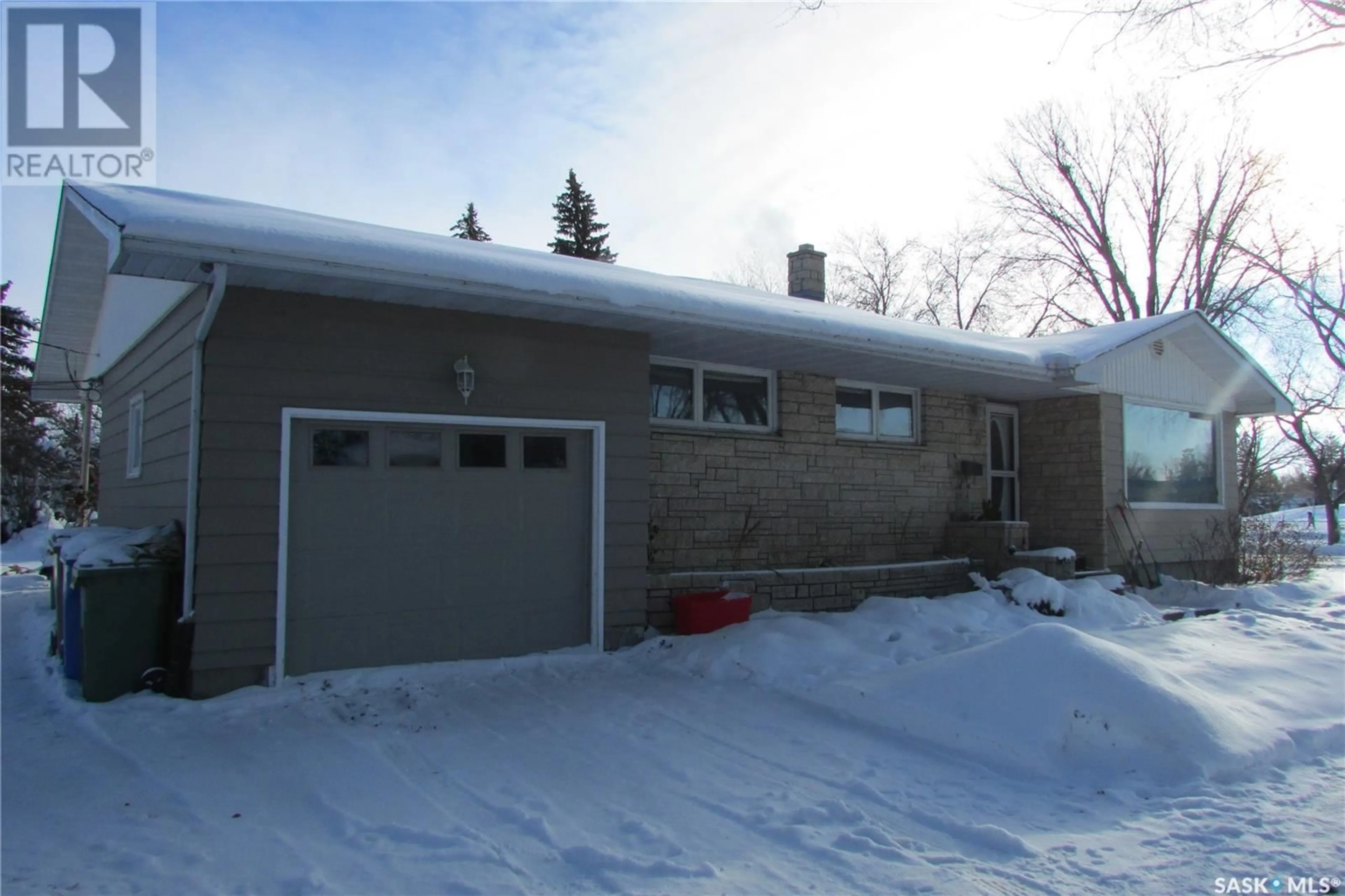 Frontside or backside of a home, the front or back of building for 55 Newlands STREET, Regina Saskatchewan S4S3S2