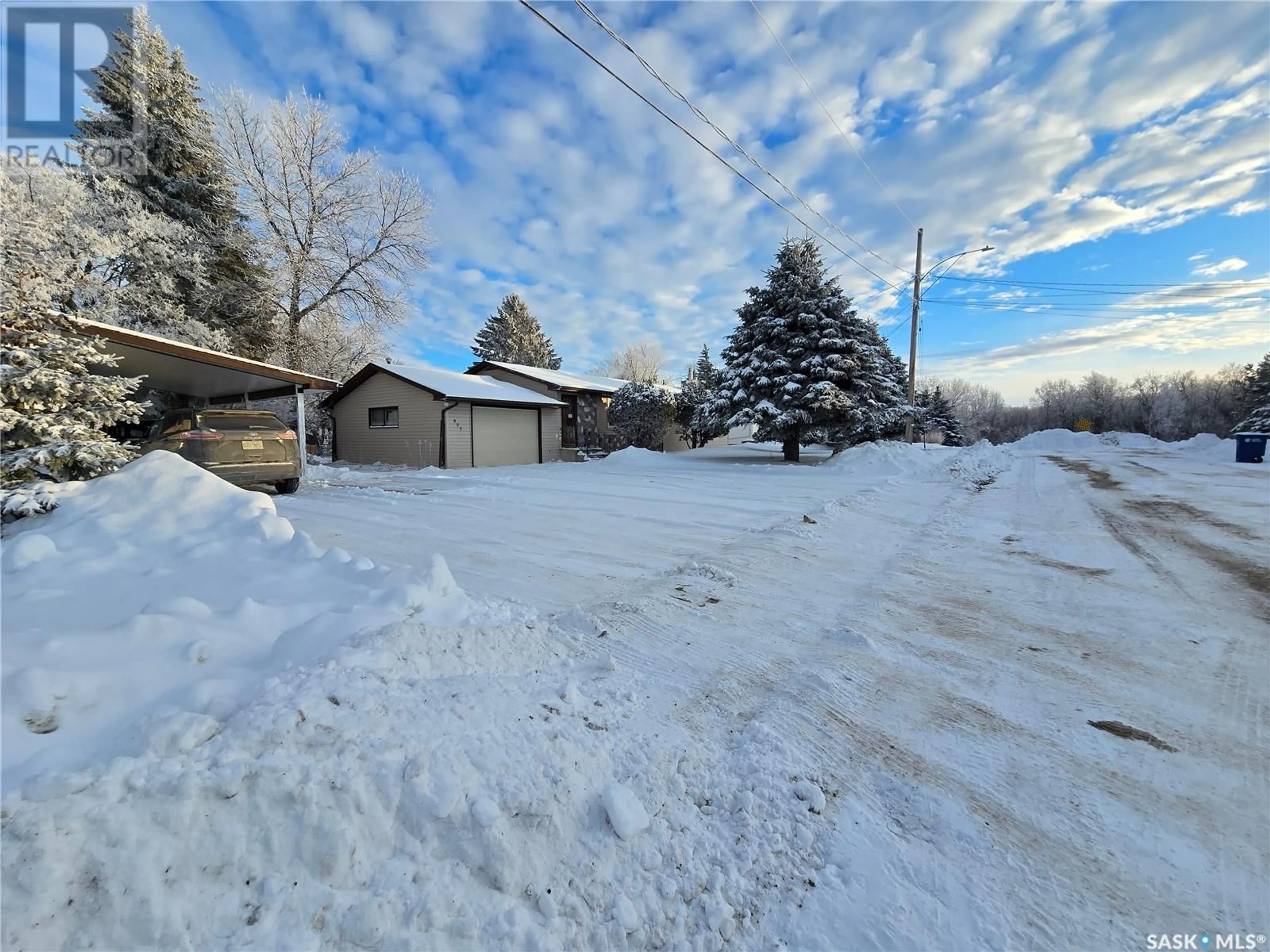 A pic from exterior of the house or condo, the street view for 903 Elsinore STREET, Whitewood Saskatchewan S0G5C0