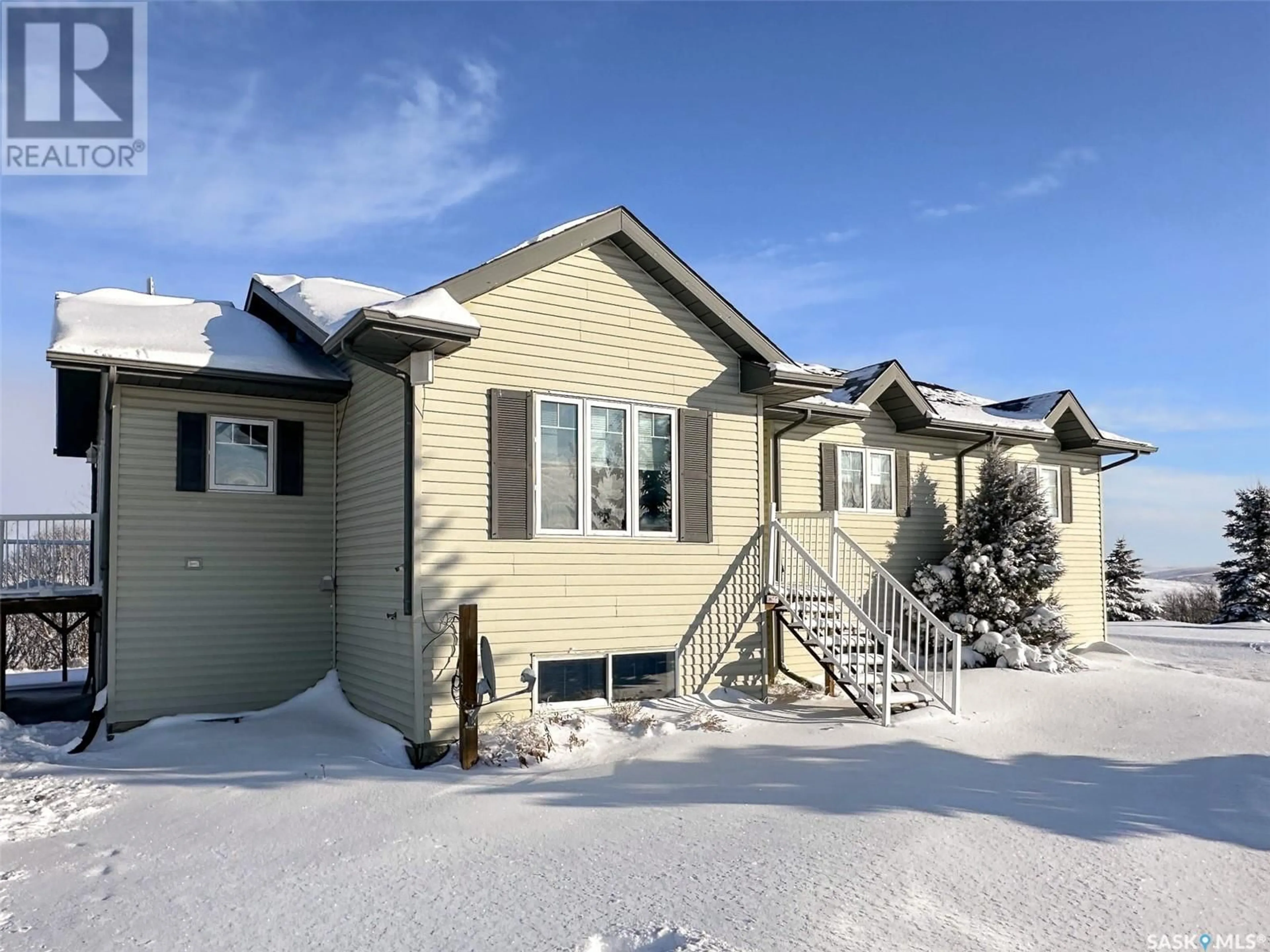 Home with vinyl exterior material, street for CHAPLIN ACREAGE, Chaplin Rm No. 164 Saskatchewan S0H0V0
