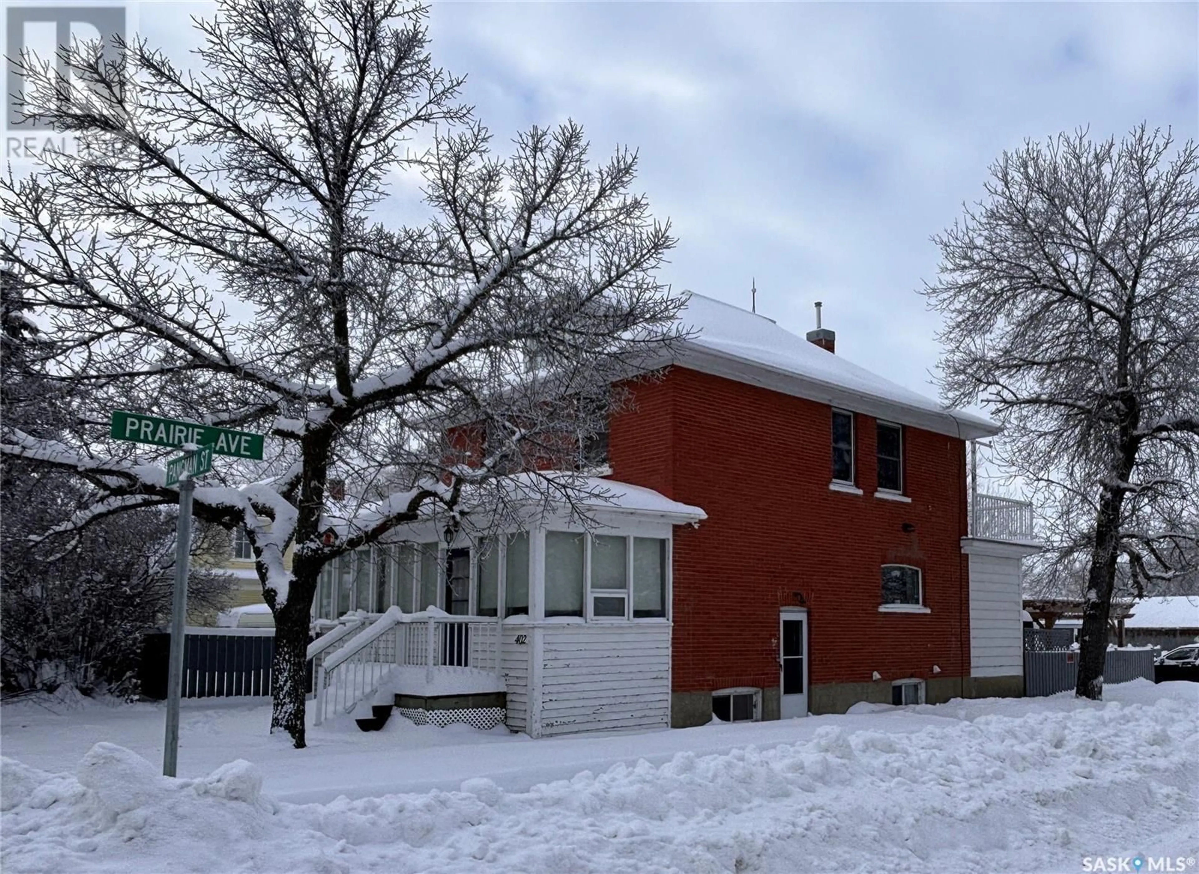 A pic from exterior of the house or condo, the street view for 402 Pangman STREET, Outlook Saskatchewan S0L2N0