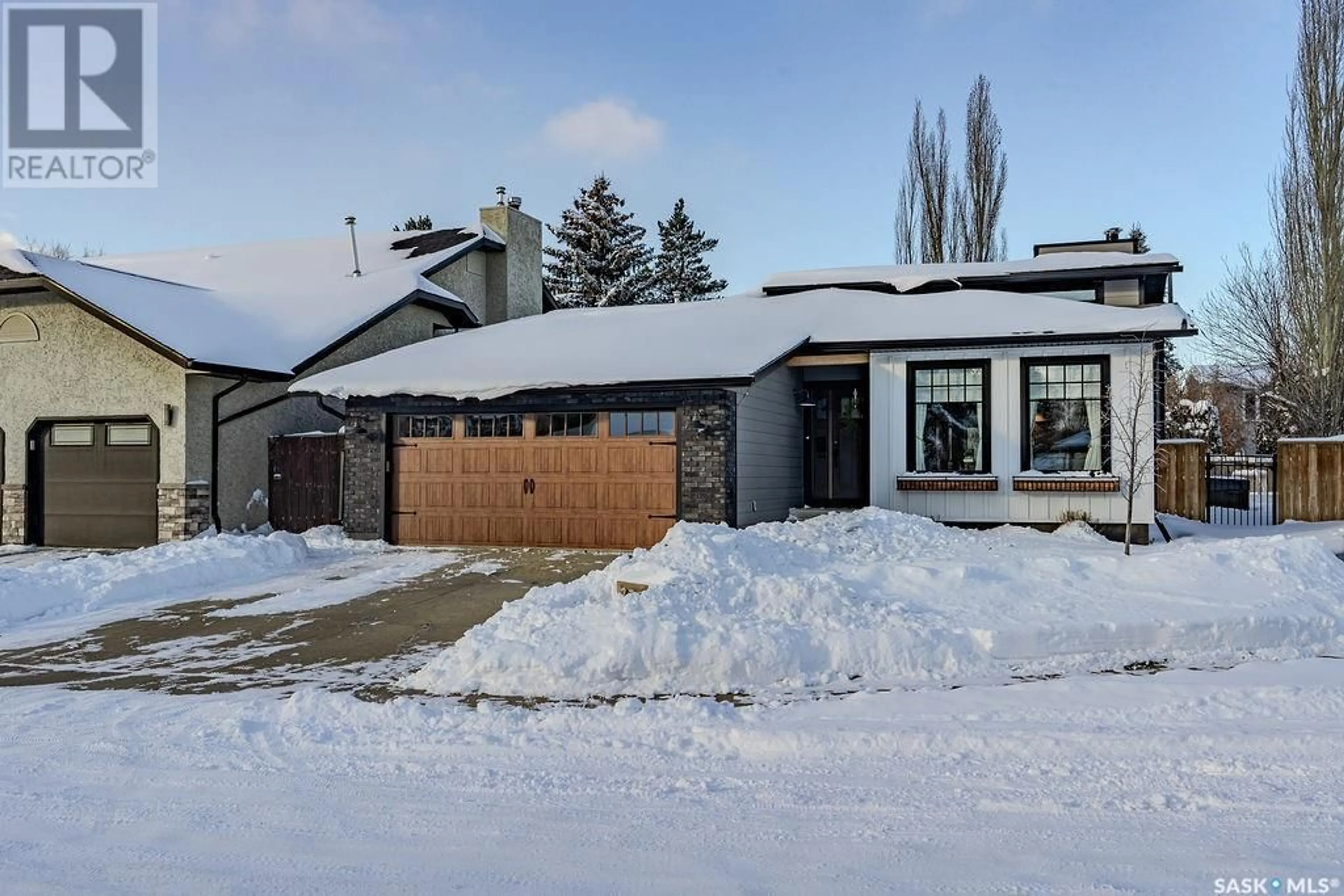 Frontside or backside of a home, the street view for 739 Whitewood COURT, Saskatoon Saskatchewan S7J4K5