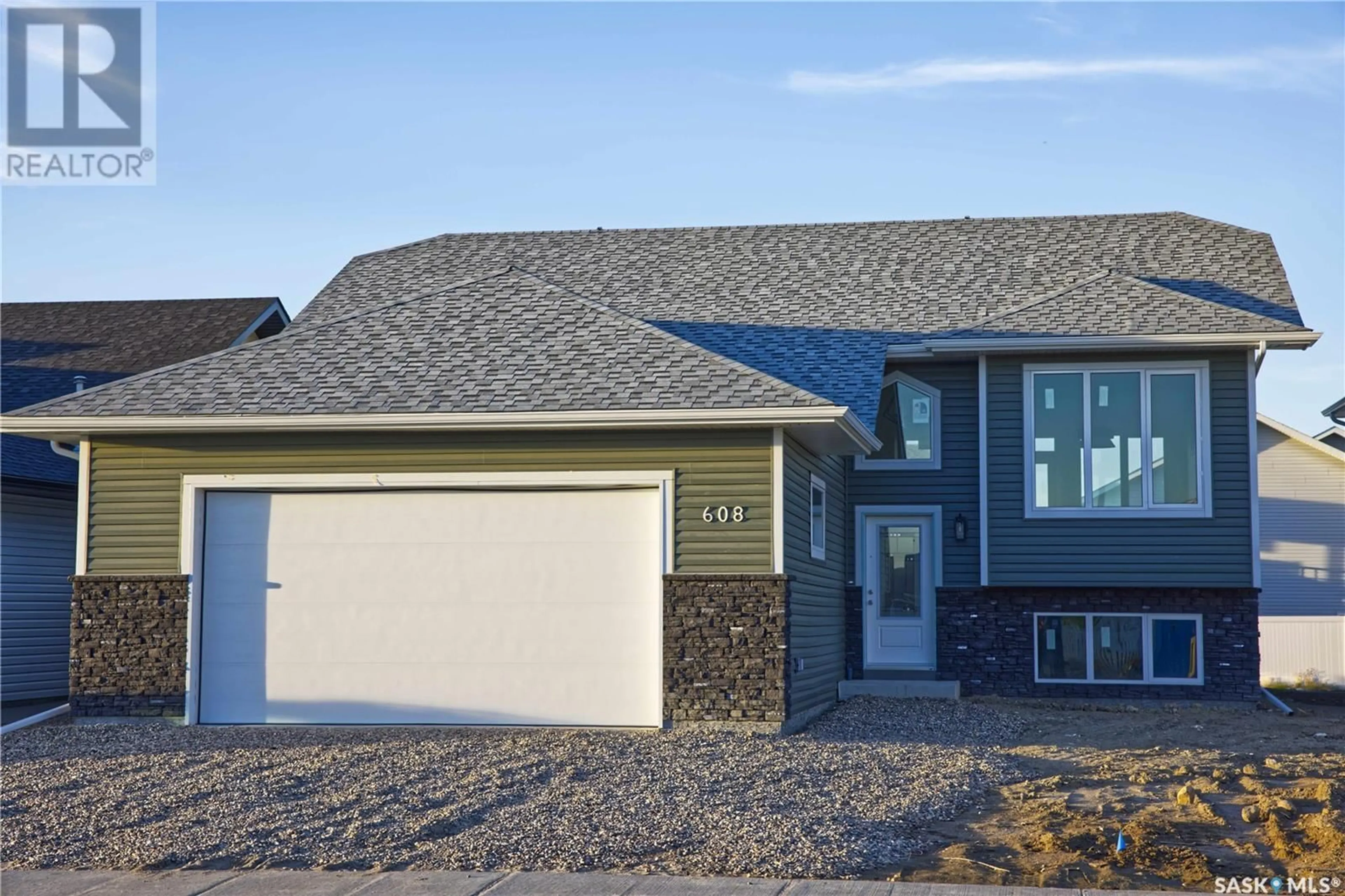 Frontside or backside of a home, cottage for 608 Weir CRESCENT, Warman Saskatchewan S0K4S1