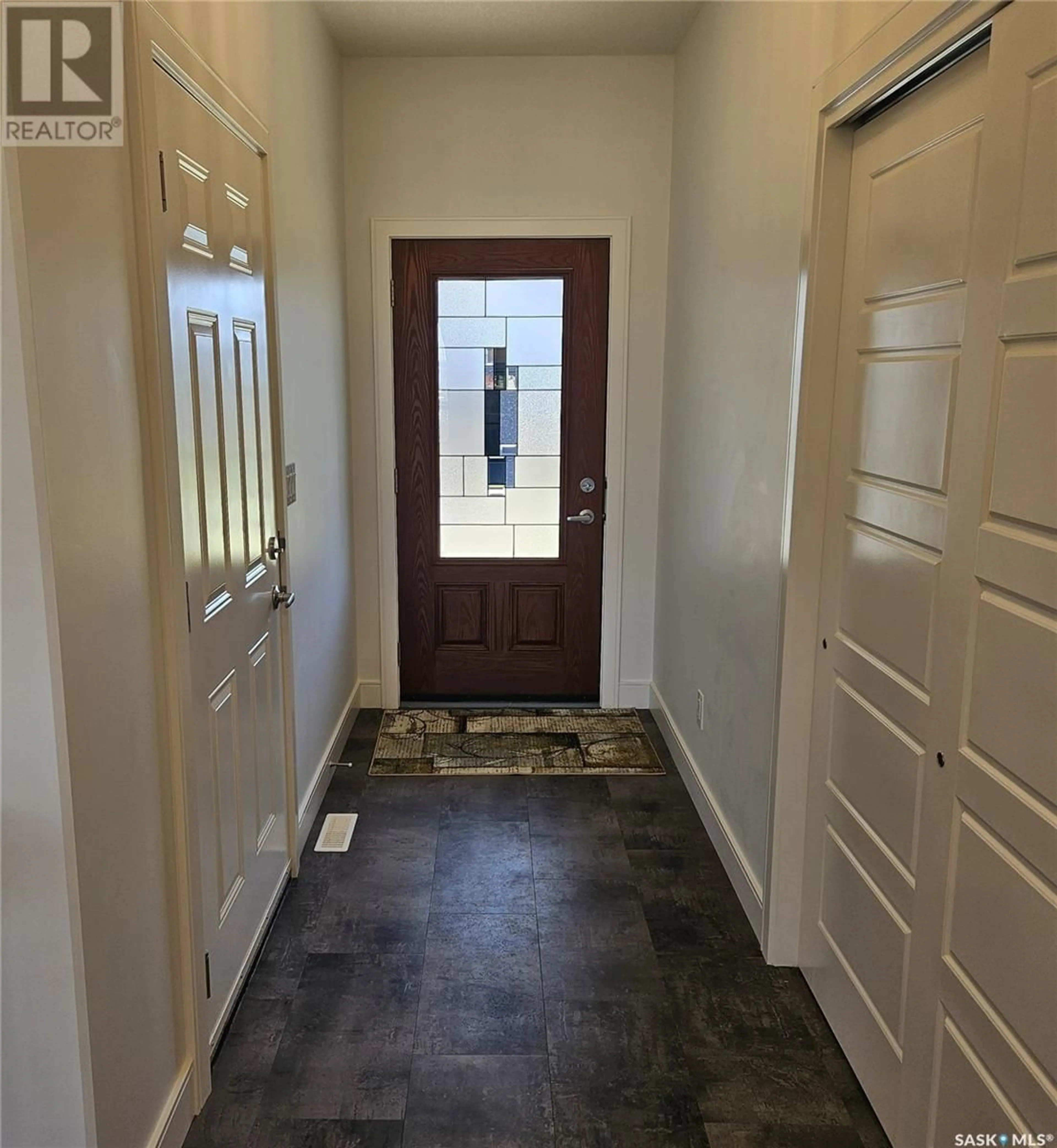 Indoor entryway, wood floors for 31 310 Evergreen BOULEVARD, Saskatoon Saskatchewan S7W0Z1