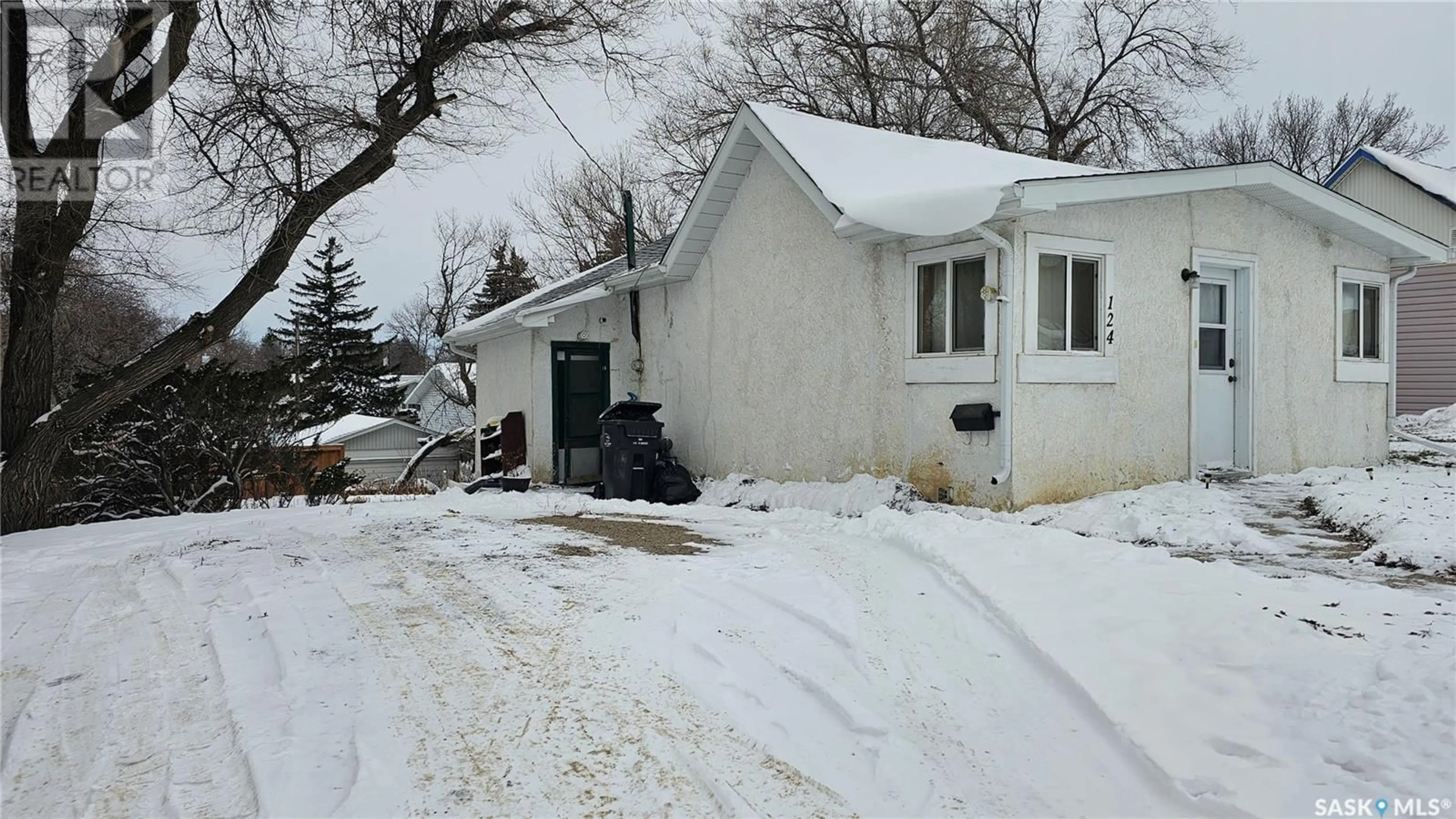 Frontside or backside of a home, cottage for 124 6th AVENUE NE, Swift Current Saskatchewan S9H2L9