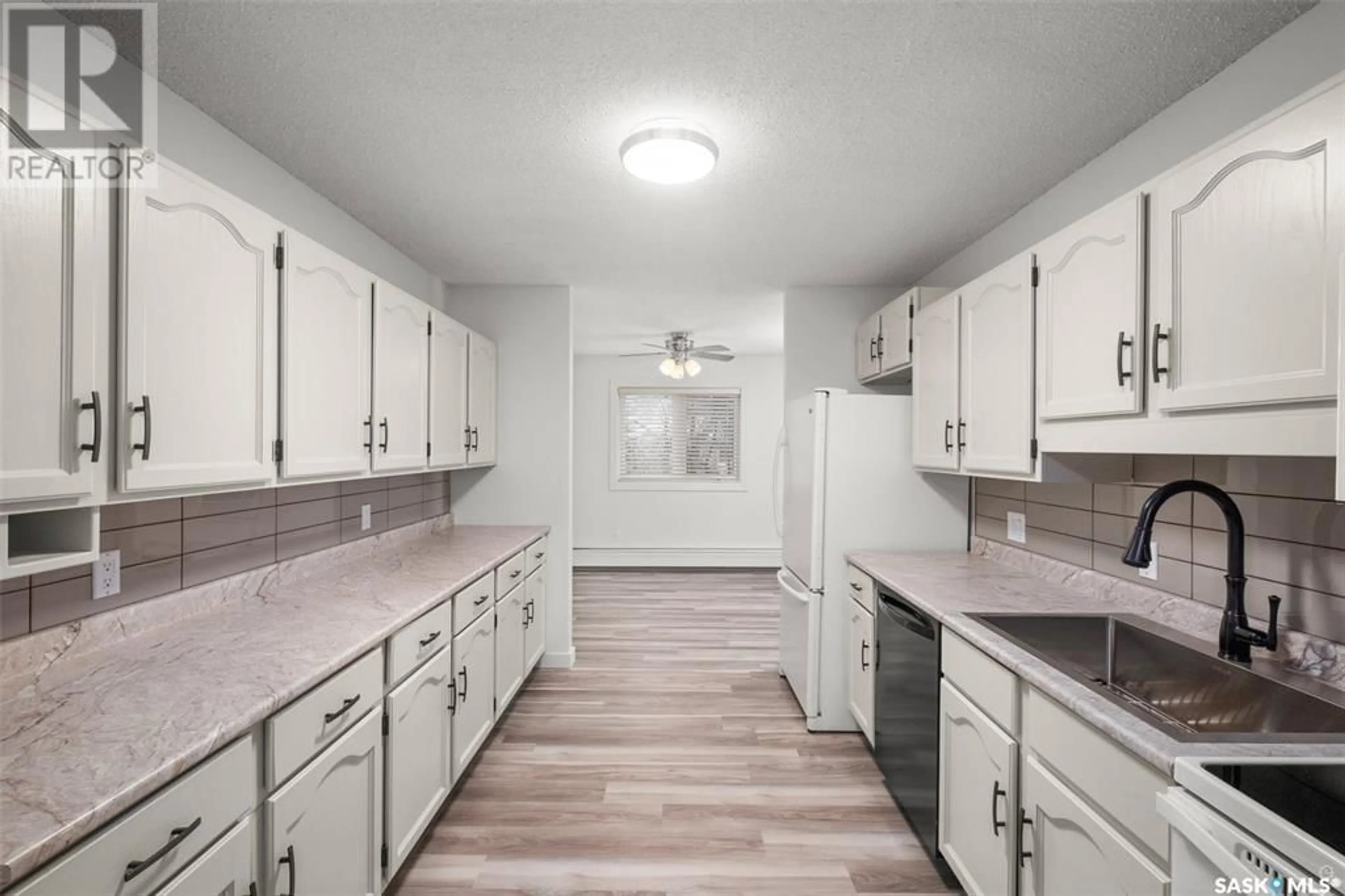 Standard kitchen, wood floors for 206 66 19th STREET W, Prince Albert Saskatchewan S6V7T6