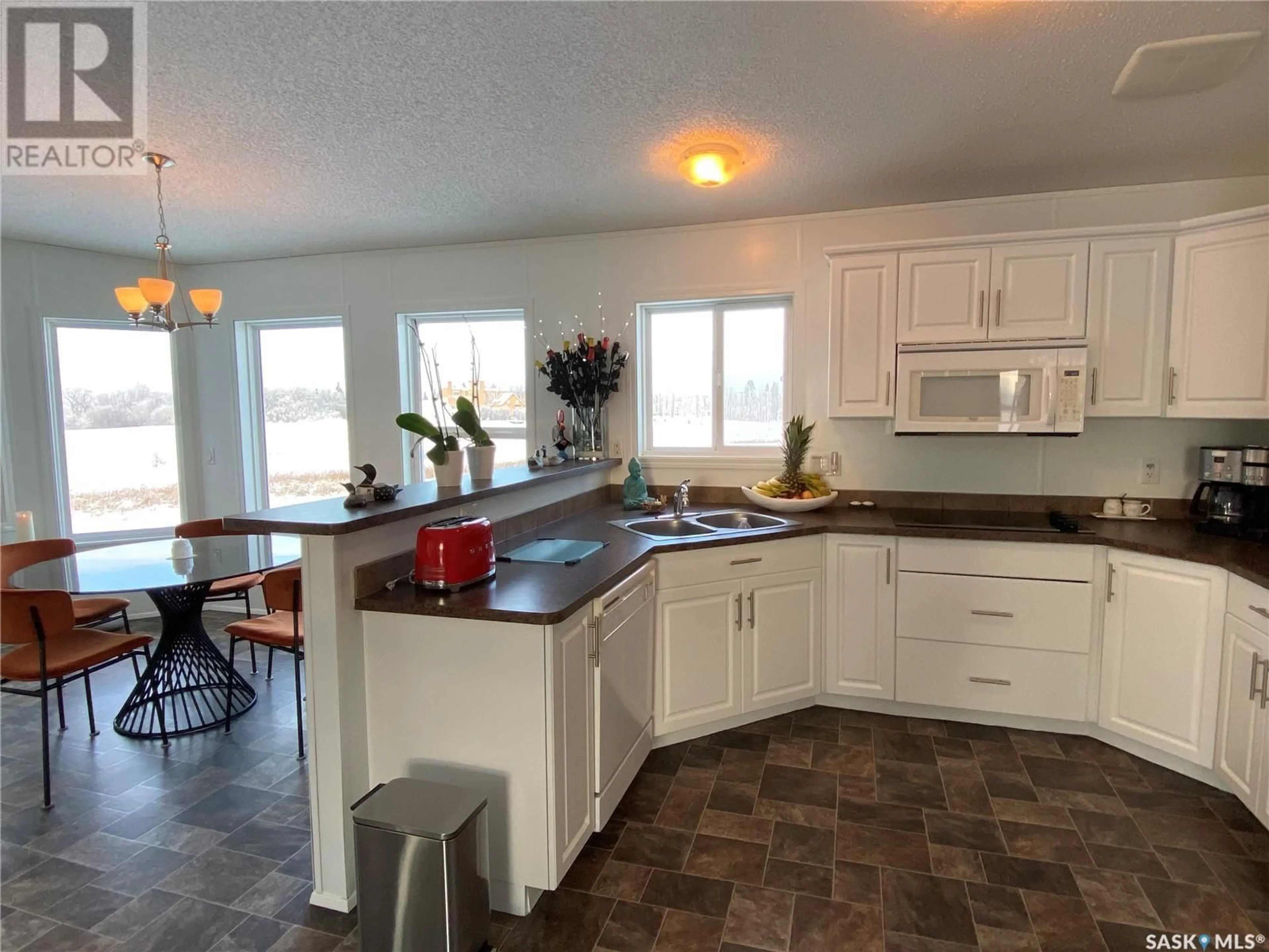 Open concept kitchen, ceramic/tile floor for 313 ELIZABETH STREET, Stockholm Saskatchewan S0A3Y0