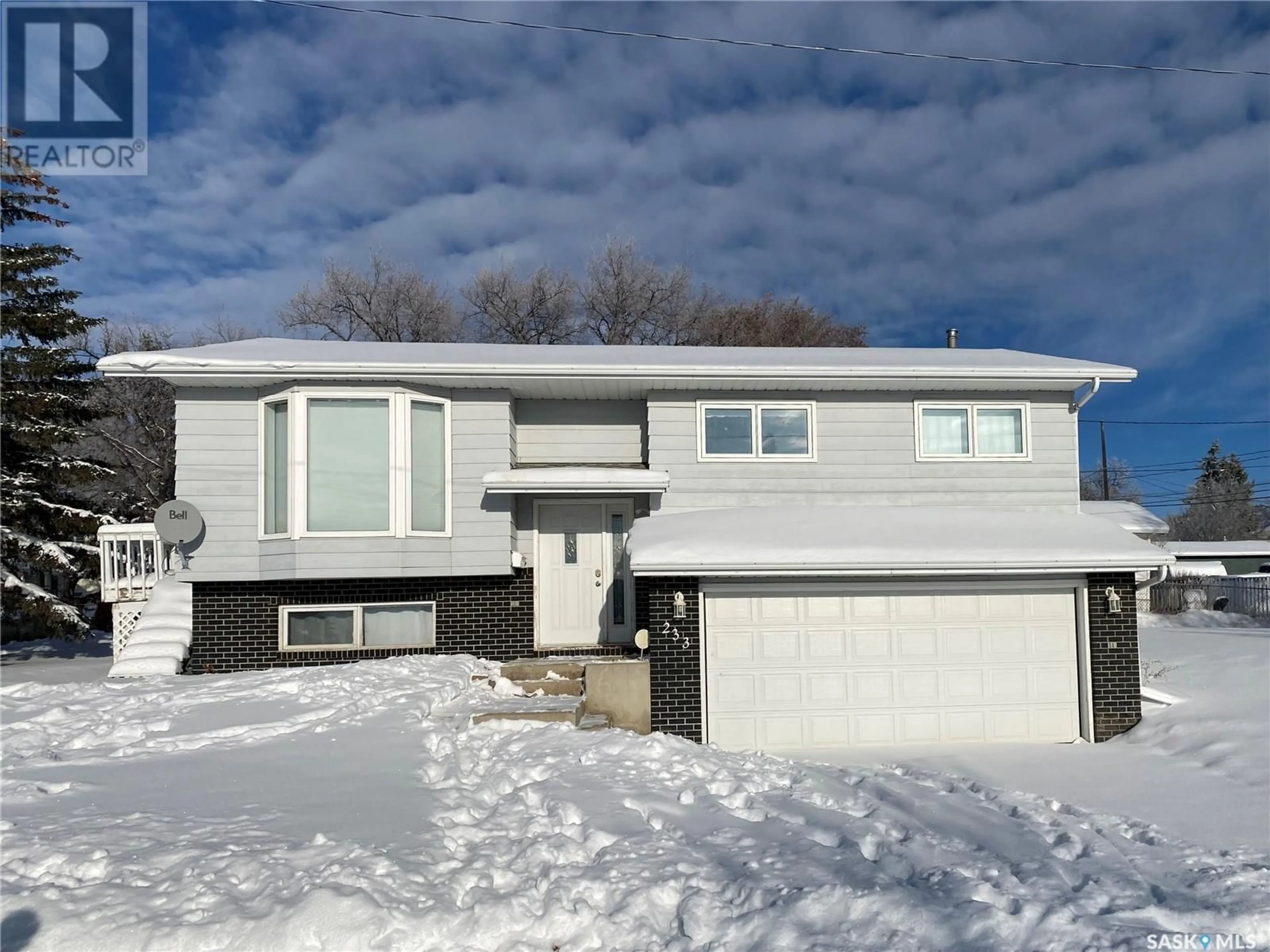 Frontside or backside of a home, the street view for 233 Lorne STREET W, Swift Current Saskatchewan S9H0J6