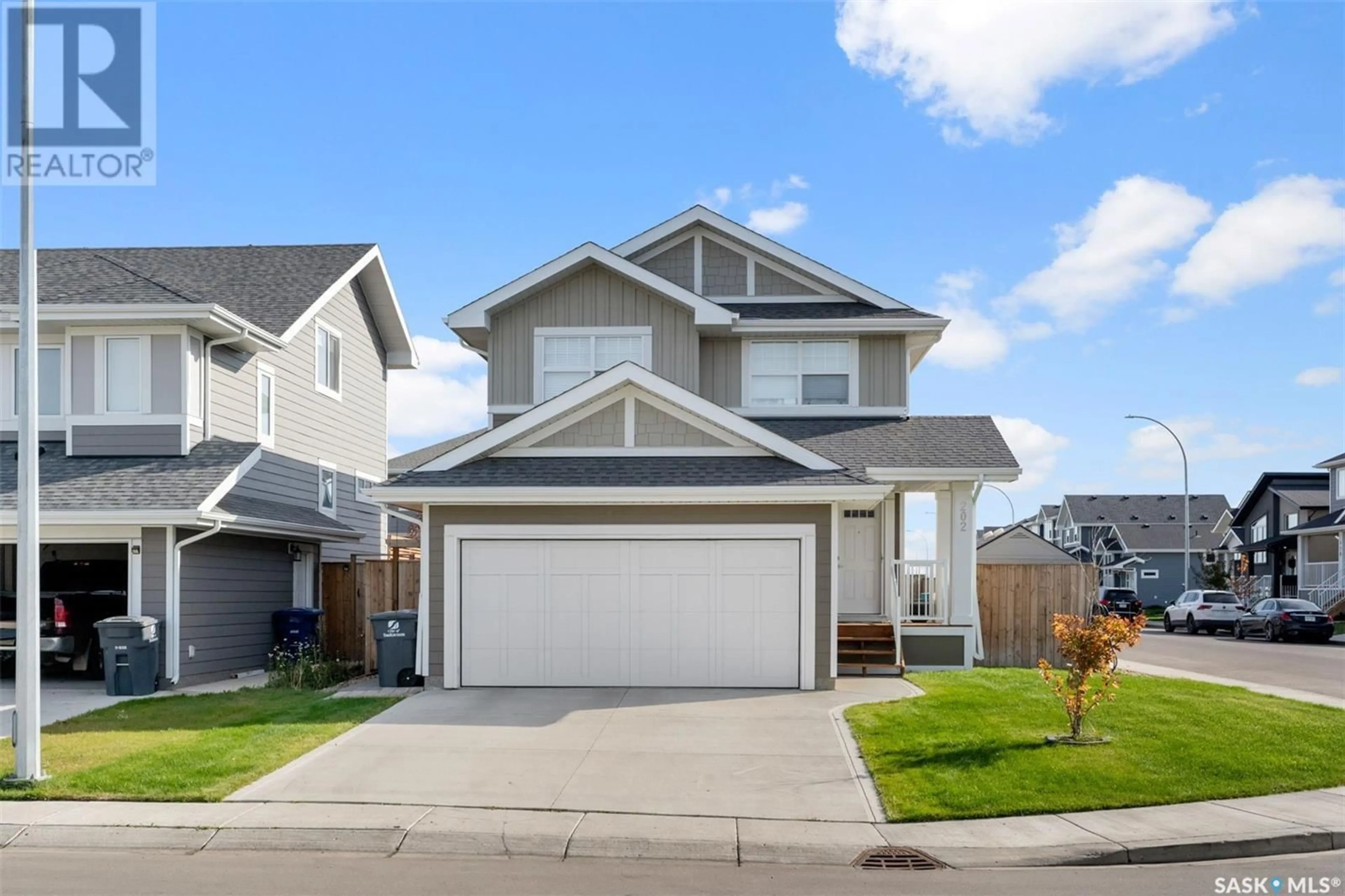 Frontside or backside of a home, the street view for 202 Stilling UNION, Saskatoon Saskatchewan S7V0P4